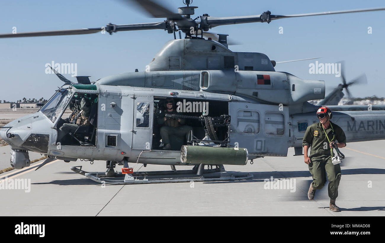 U.S. Marines with Marine Aviation Weapons and Tactics Squadron One (MAWTS-1), prepare for takeoff during Weapons and Tactics Instructors Course (WTI) 1-18 from Marine corps Air Station Yuma, Az., Oct 03, 2017. WTI is a seven-week training event hosted by Marine Aviation Weapons and Tactics Squadron (MAWTS-1) cadre, which emphasizes operational integration of the six functions Marine Aviation in support of a Marine Air Ground Task Force. MAWTS-1 provides standardized advanced tactical training and certification of unit instructor qualifications to support Marine Aviation Training and Readiness  Stock Photo