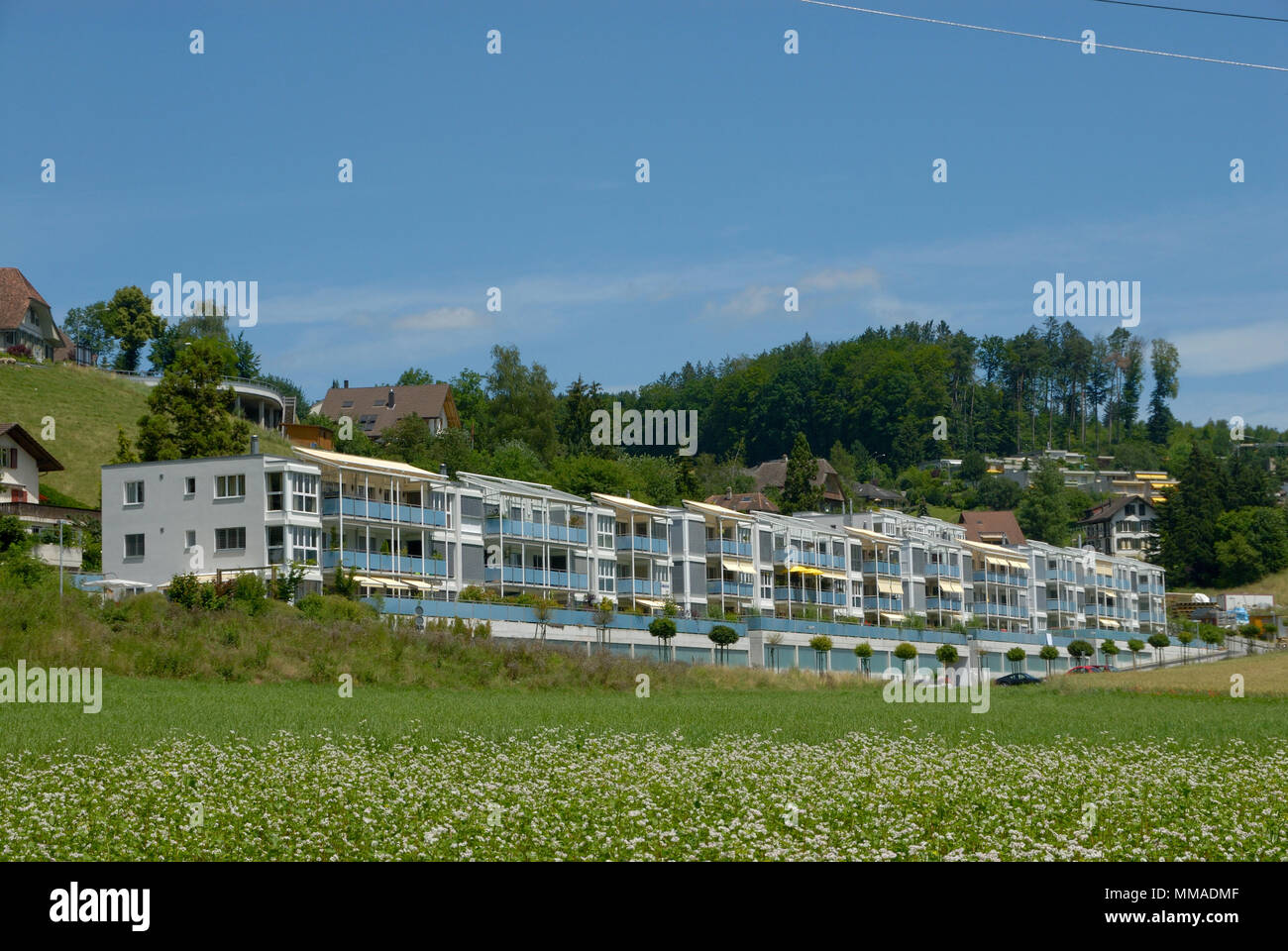 Apartment building on the coutryside in switzerland Stock Photo