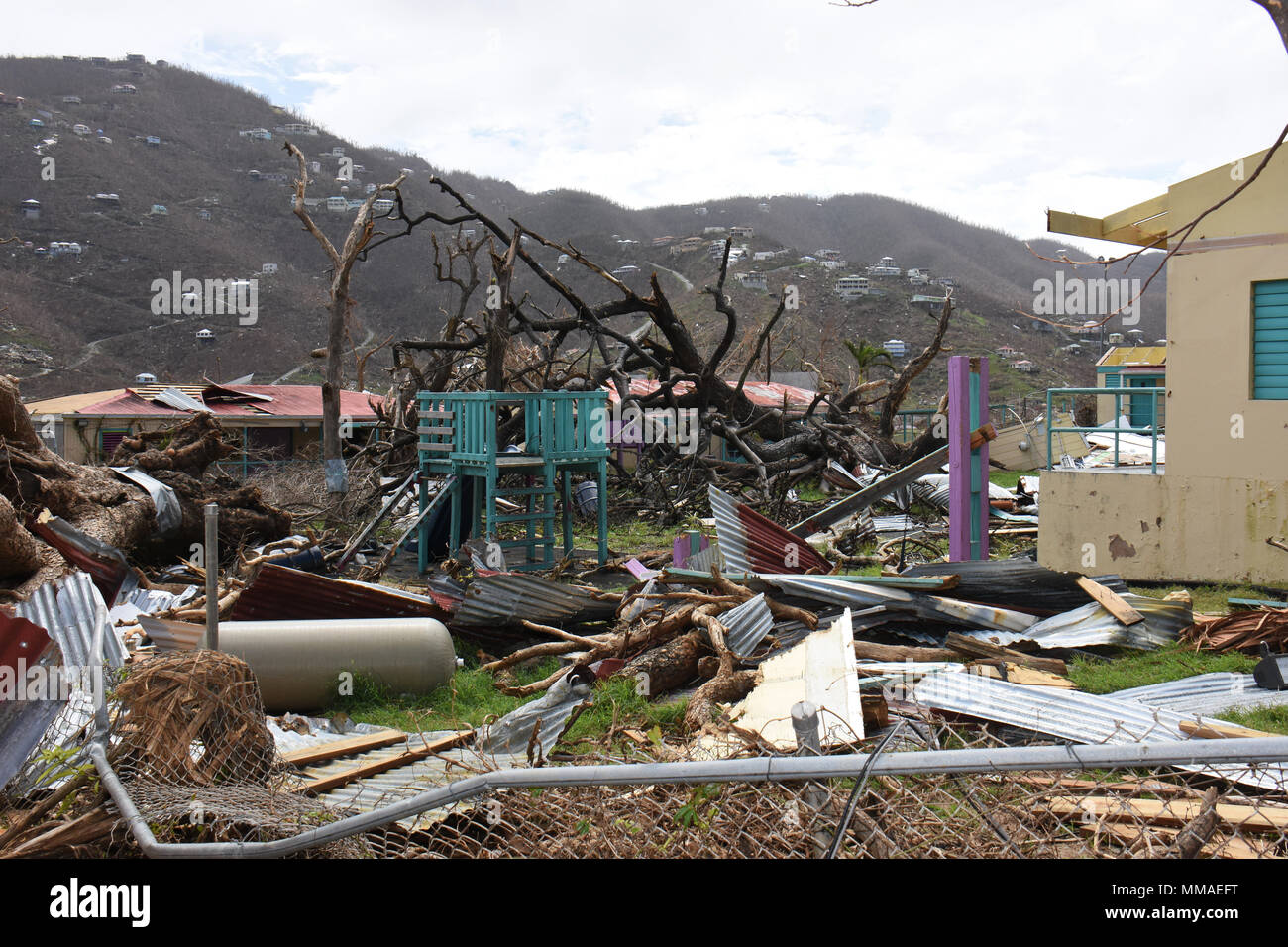 Severe structural and environmental damage levied by the passing of Hurricanes Irma and Maria as seen Sept. 25, 2017 on the island of St. John in the U.S. Virgin Islands. Following the historic storms, National Guard members were deployed from throughout the United States to support civil authorities with massive recovery efforts in both the Virgin Islands and Puerto Rico. (U.S. Air National Guard photo by Master Sgt. Paul Gorman) Stock Photo