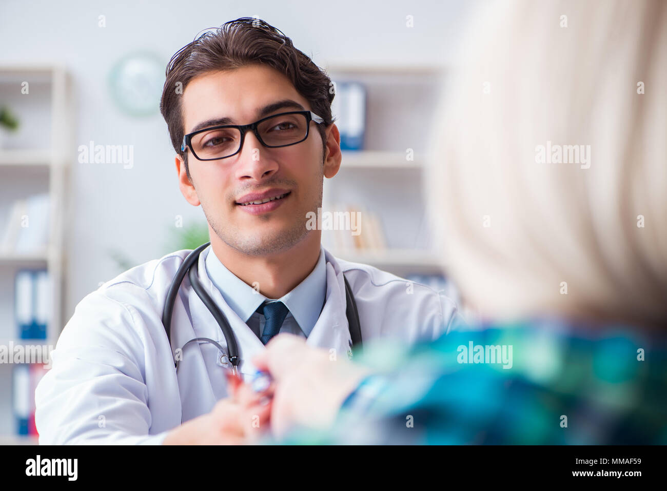 Patient visiting doctor for medical checkup in hospital Stock Photo Alamy