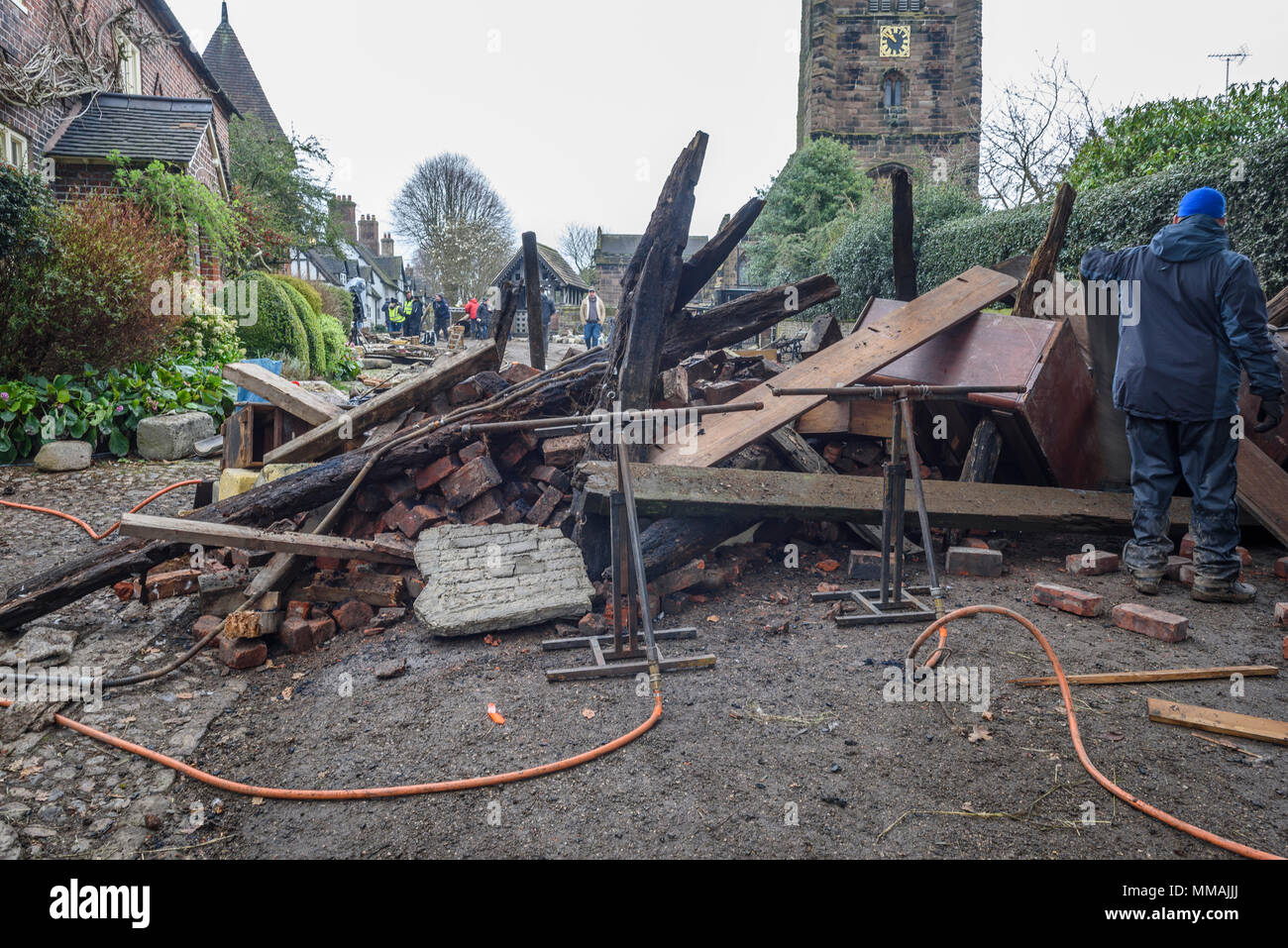 11th April, 2018. Props and debris with flame bars being set up for a dramatic scene in Great Budworth, cheshire Village for war of the worlds. Stock Photo