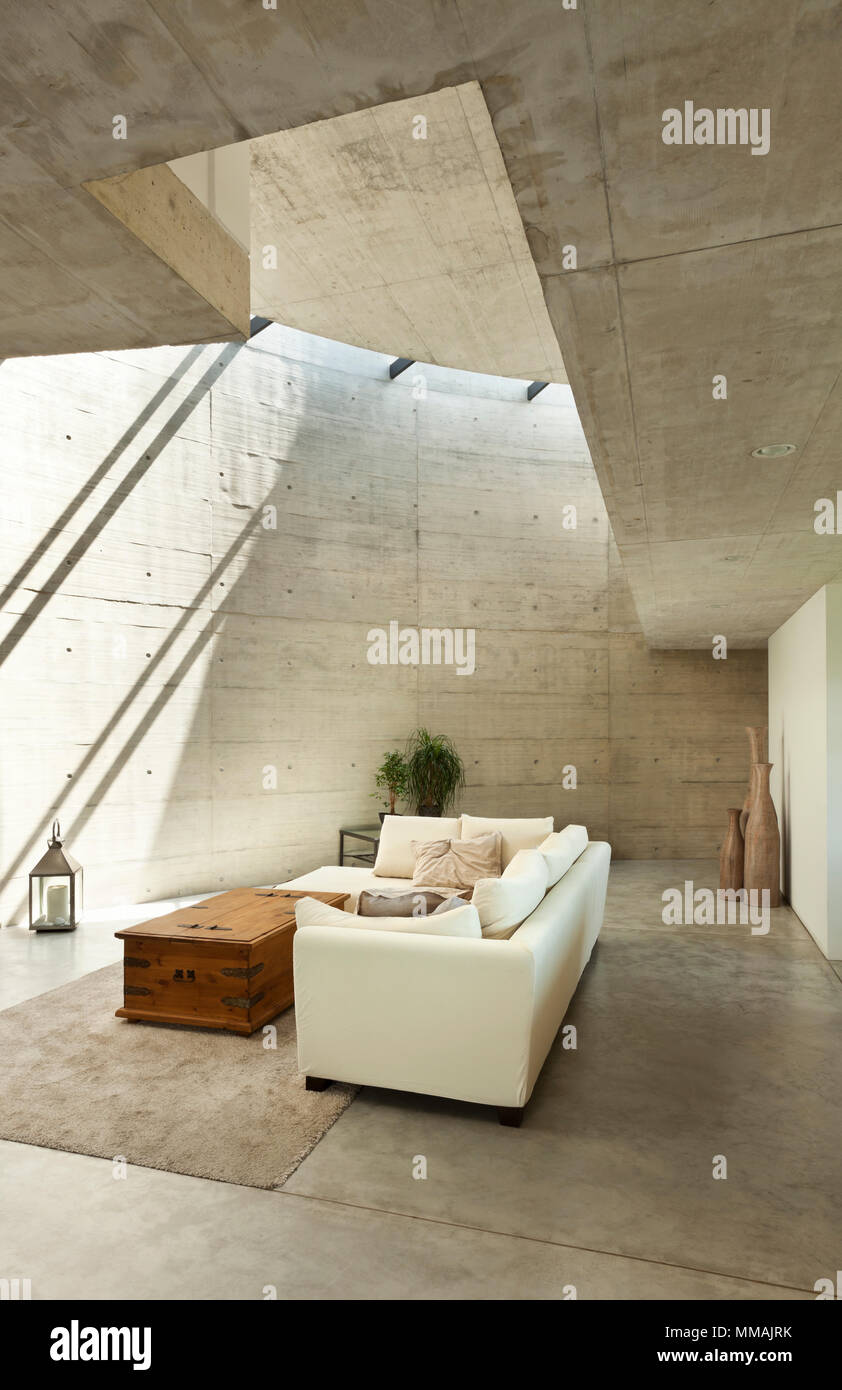 beautiful modern house in cement, interior, living room Stock Photo - Alamy