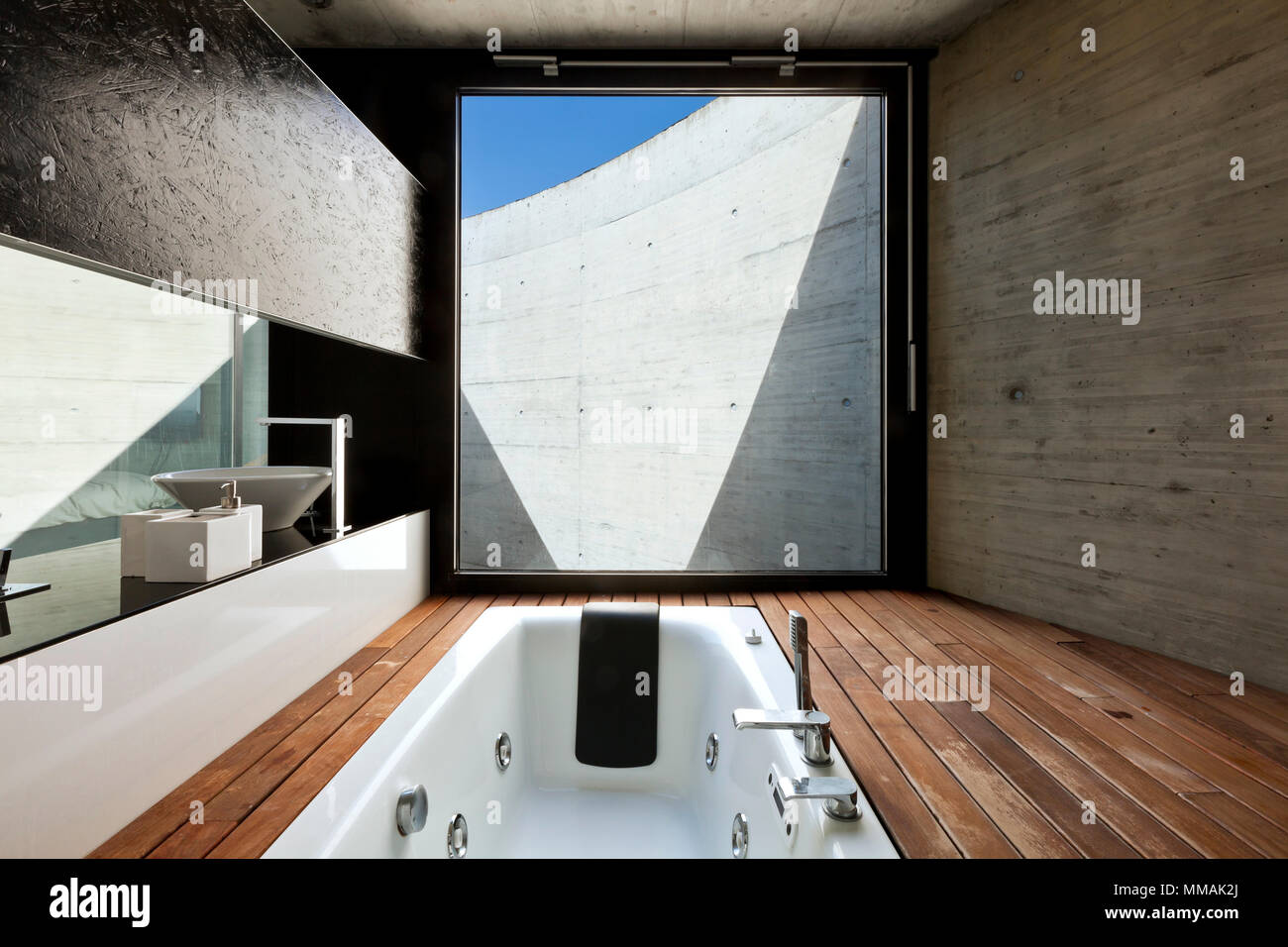 beautiful modern house in cement, interior, bathroom Stock Photo