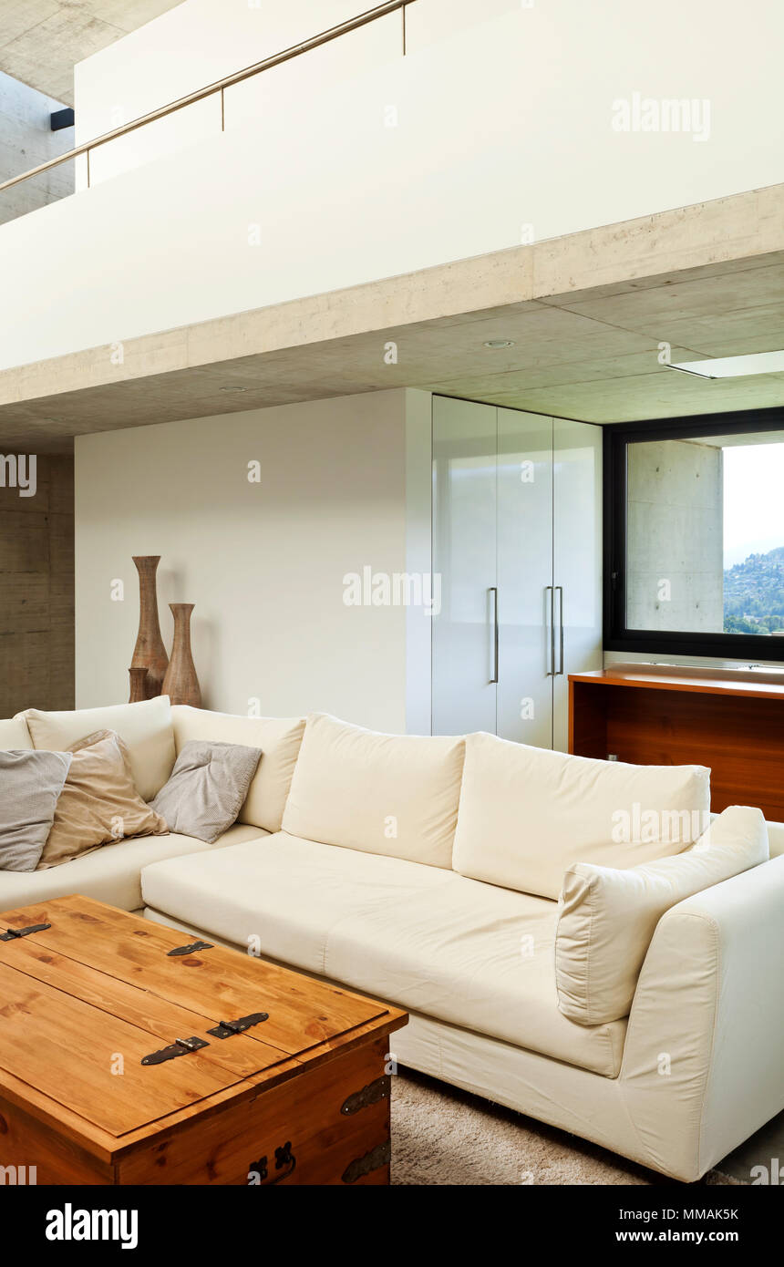 beautiful modern house in cement, interior, living room Stock Photo - Alamy