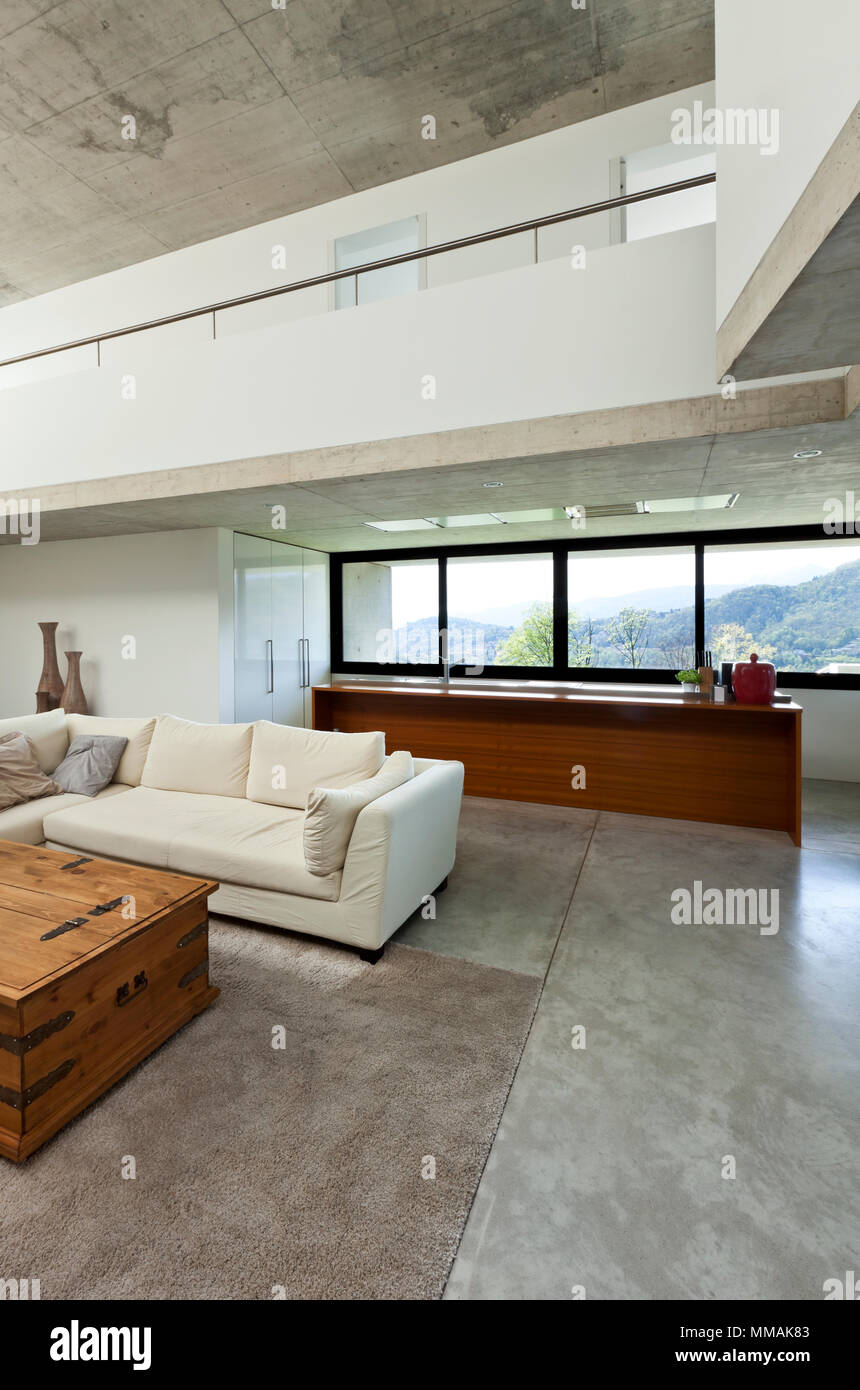 beautiful modern house in cement, interior, living room Stock Photo - Alamy