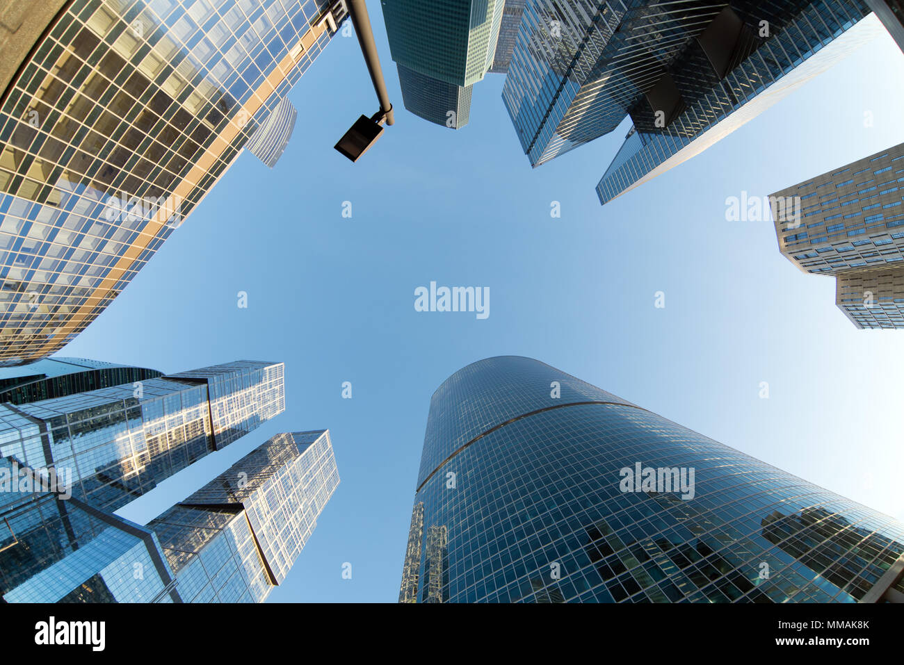 Perspective low angle view of modern glass skyscrapers facades Stock ...