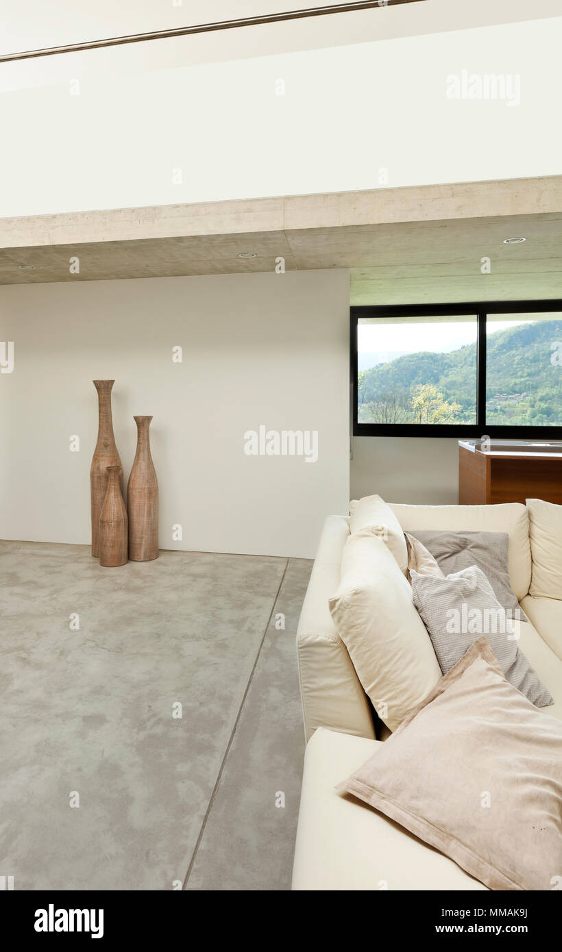 beautiful modern house in cement, interior, living room Stock Photo - Alamy