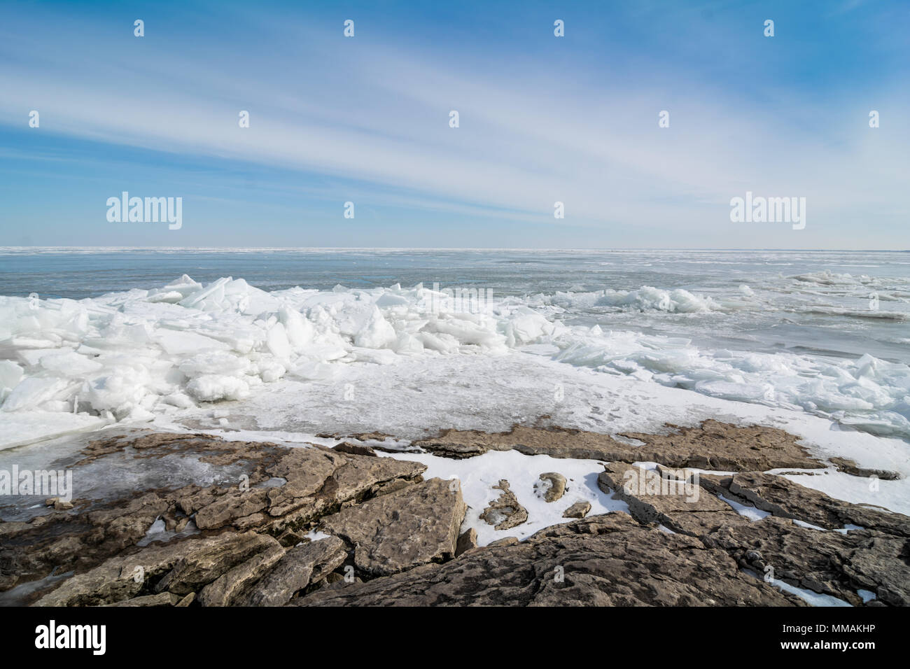 The icy, cold and rocky shore of Lake Erie In Northwest Ohio. Stock Photo