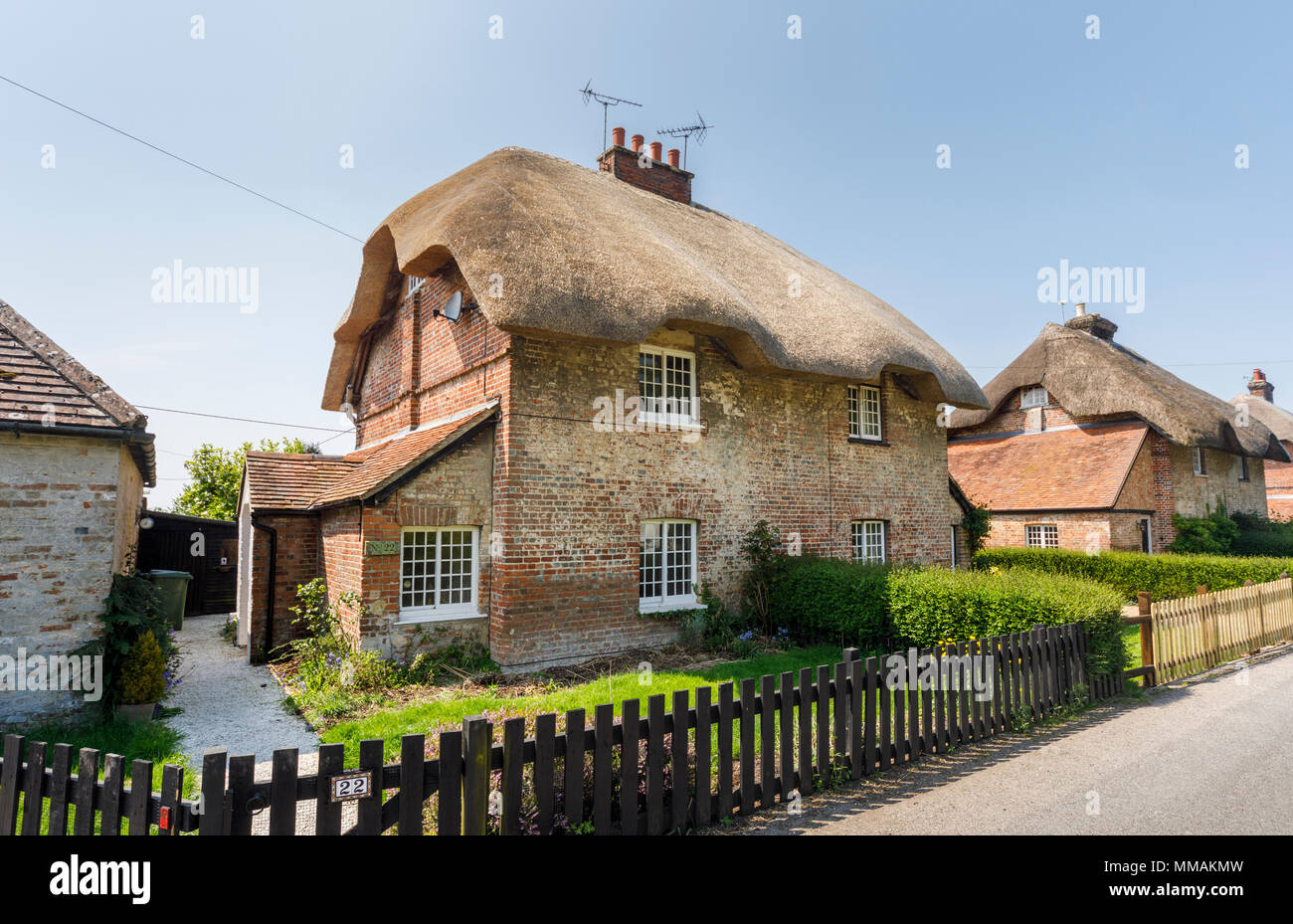 Attractive red brick local style thatched cottage / cottages in East