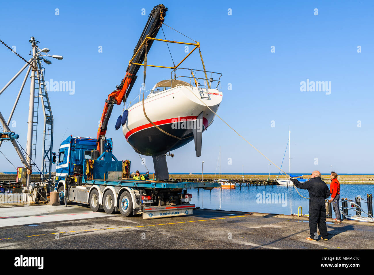 Lifting boat with mobile crane hi-res stock photography and images - Alamy