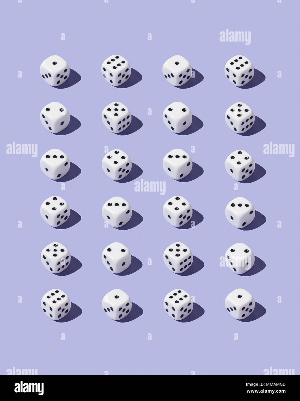 Dices organized in a row over blue background Stock Photo