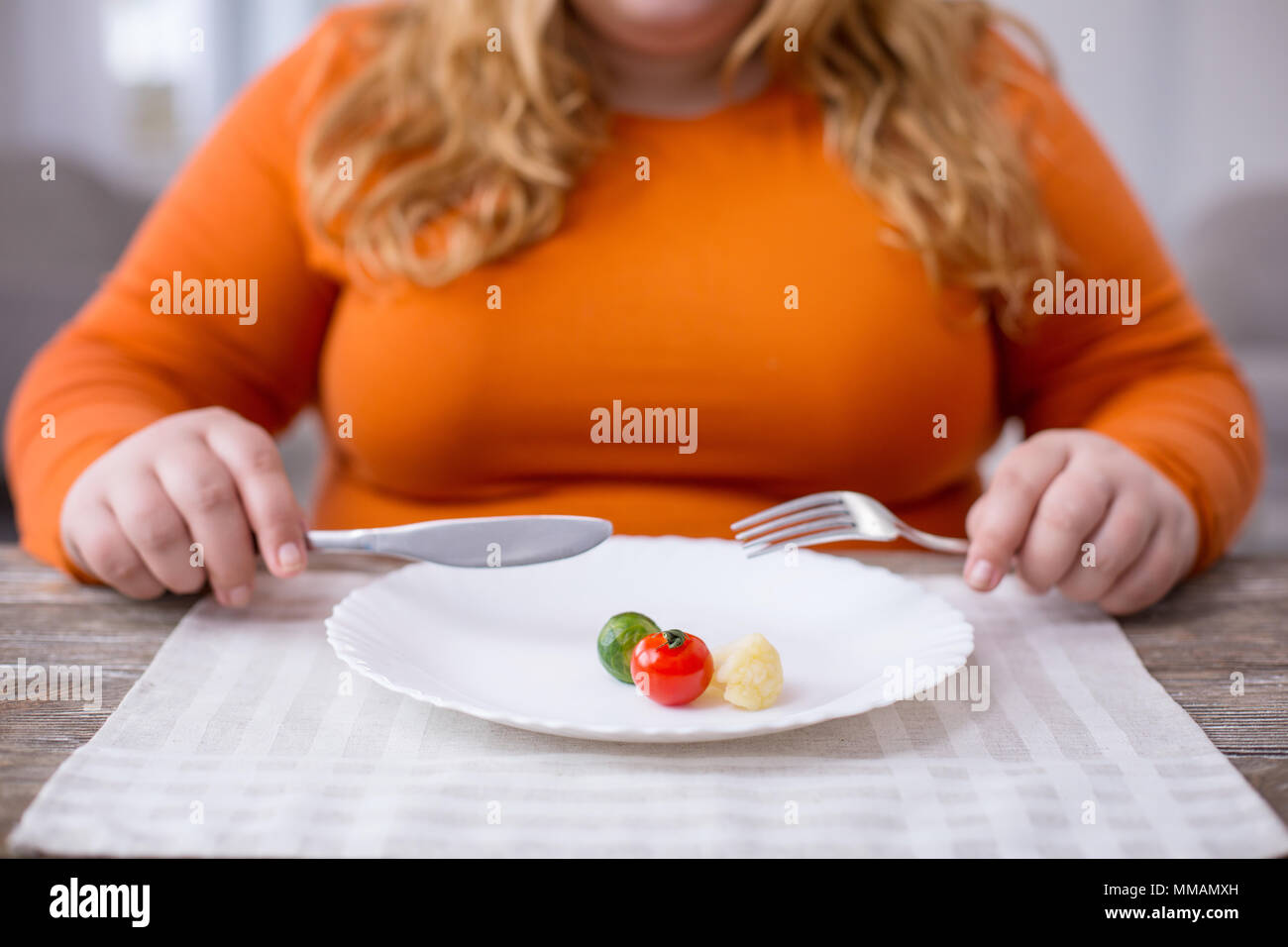 Overweight woman being on a healthy diet Stock Photo