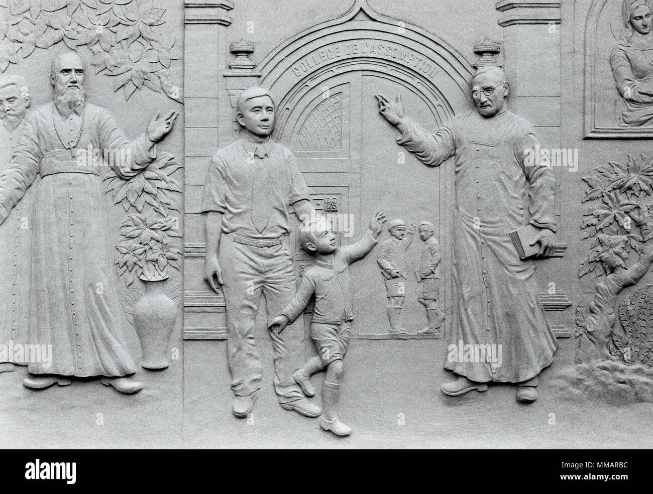 Relief art outside the Roman Catholic Assumption Cathedral in Bangkok in Thailand in Southeast Asia Far East. Religion Religious Christian Travel B&W Stock Photo