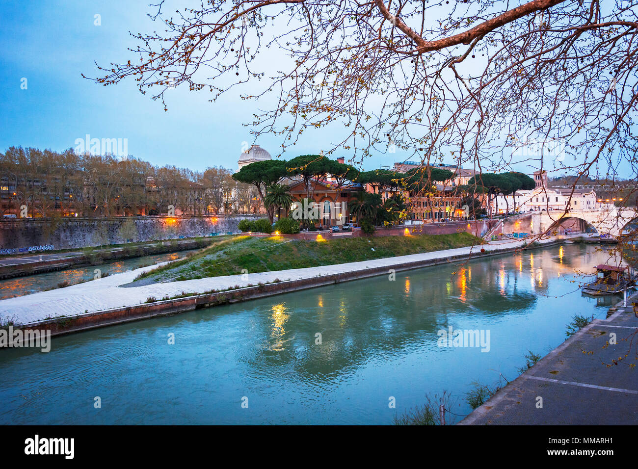 The historical Tiber island from the Garibaldi Bridge in Rome. Stock Photo