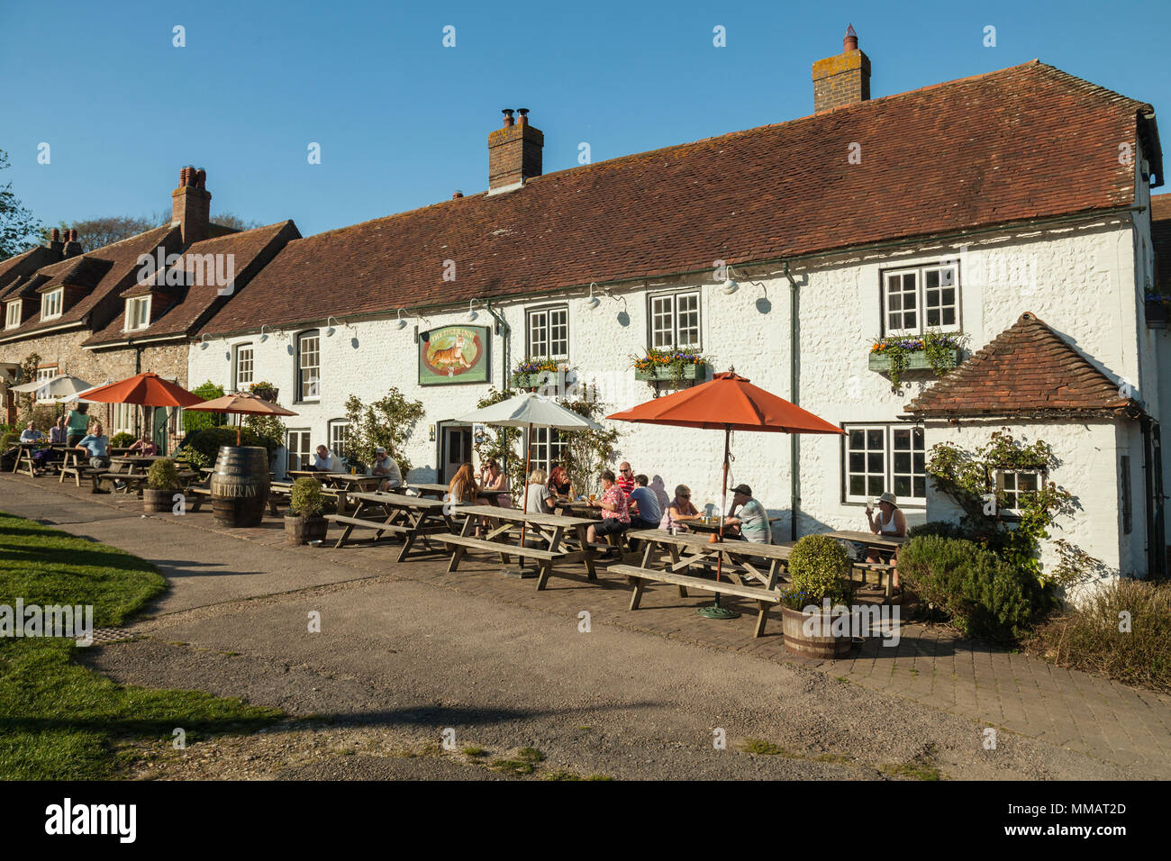 Spring afternoon at Tiger Inn in East Dean village, East Sussex Stock