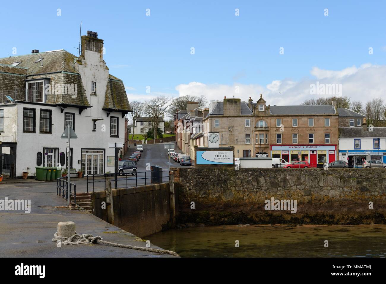 The Quayhead, Royal George hotel and Cardiff Street at the pier in Millport, Cumbrae, Scotland, UK Stock Photo