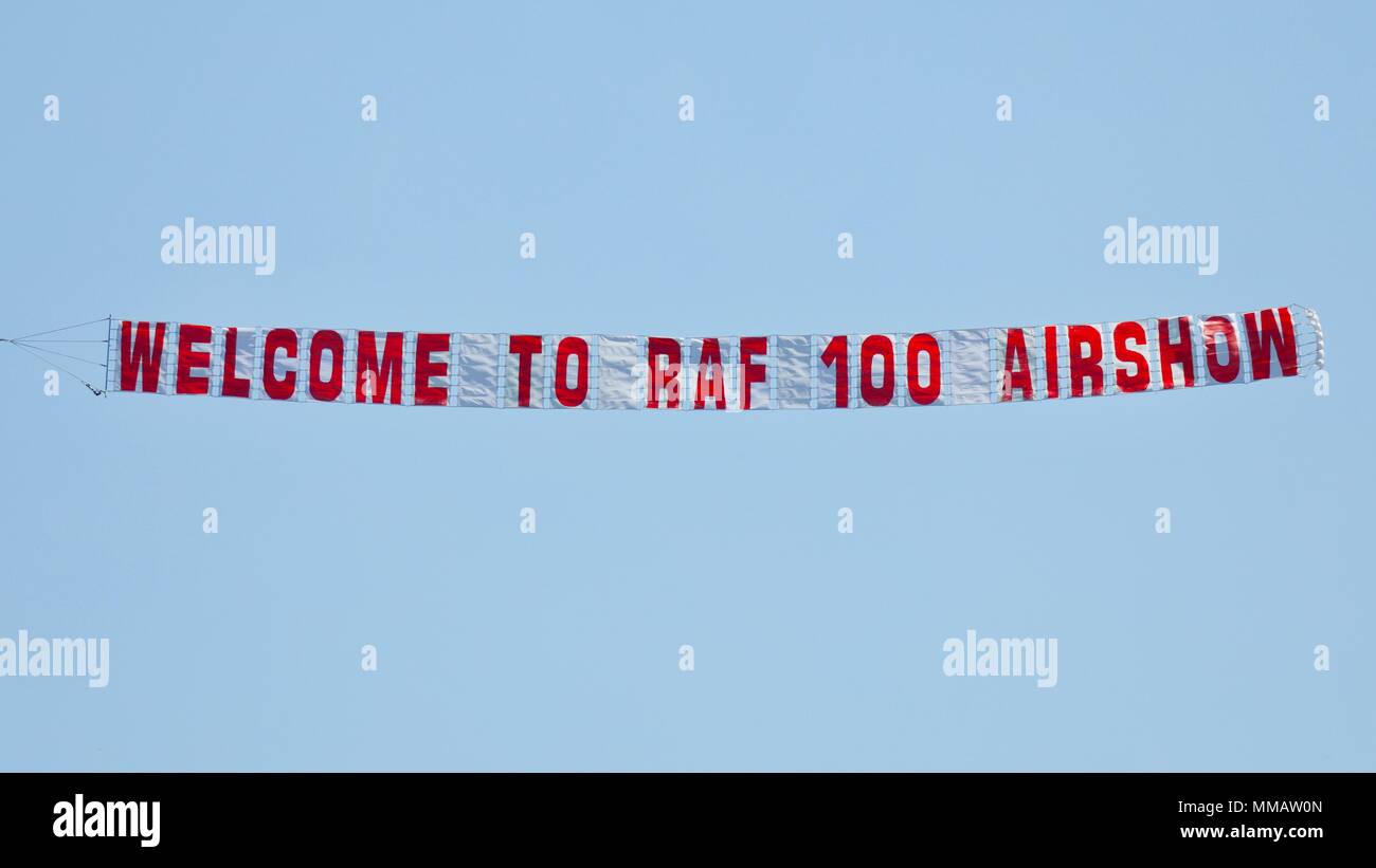 Flying banner ‘ welcome to raf 100 airshow’  Season Premiere and RAF Centenary airshow at Shuttleworth Stock Photo