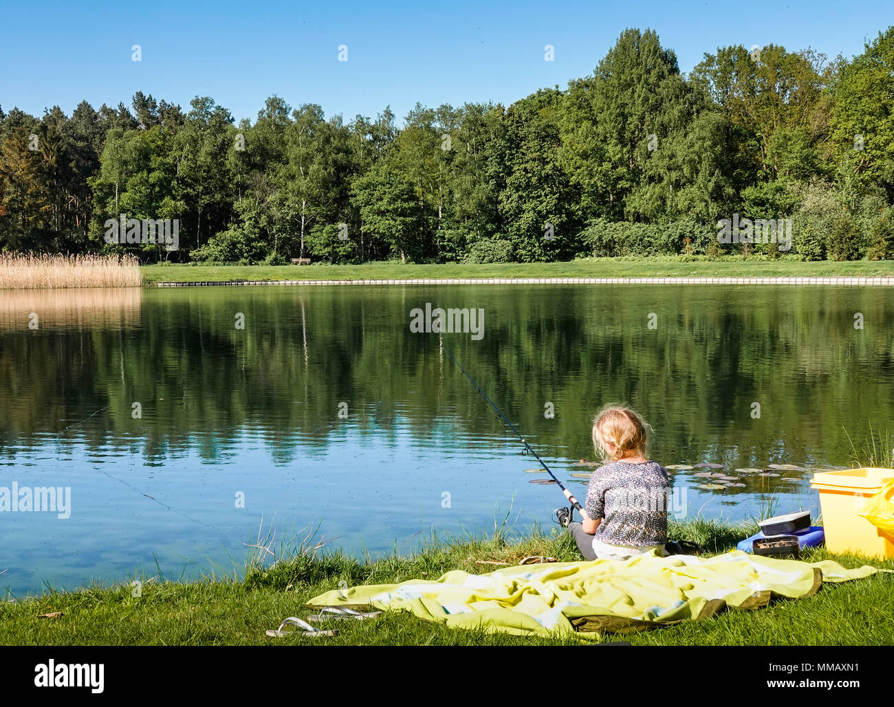 A young girl fishing Stock Photo