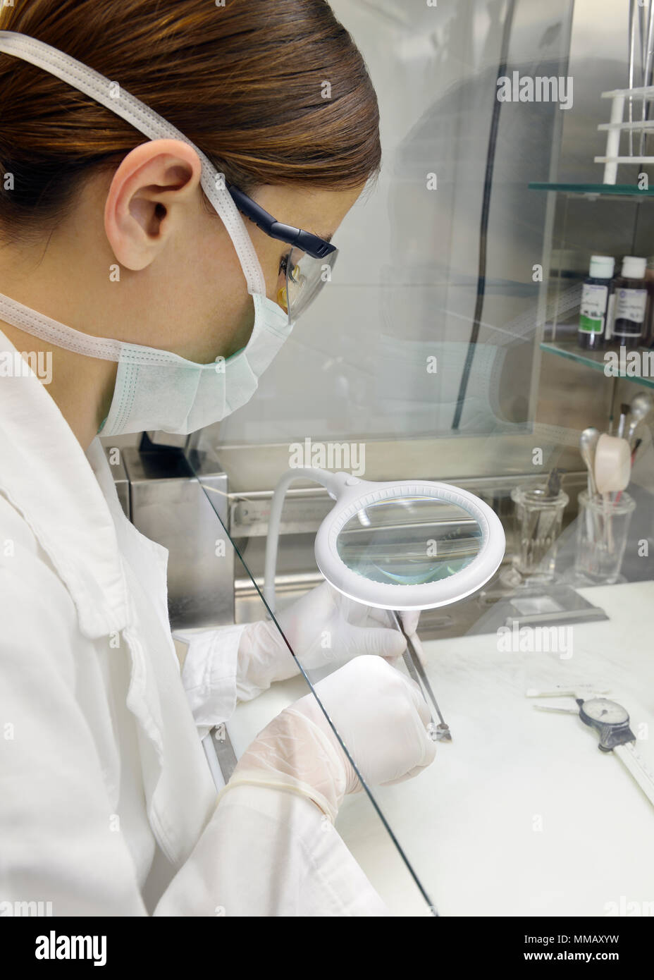 Pathologist Examining a Tumor in a Hospital Laboratory Stock Photo