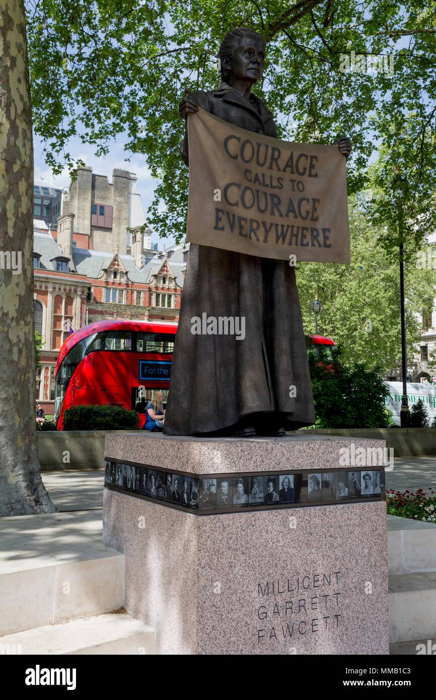 Admirers of suffragist Millicent Garrett Fawcett's statue, the first woman to appear among an all-male Parliament Square, on 9th May 2018, in London, England. Dame Millicent Garrett Fawcett GBE was a British feminist, intellectual, political leader, activist and writer. She is primarily known for her work as a campaigner for women's suffrage Stock Photo