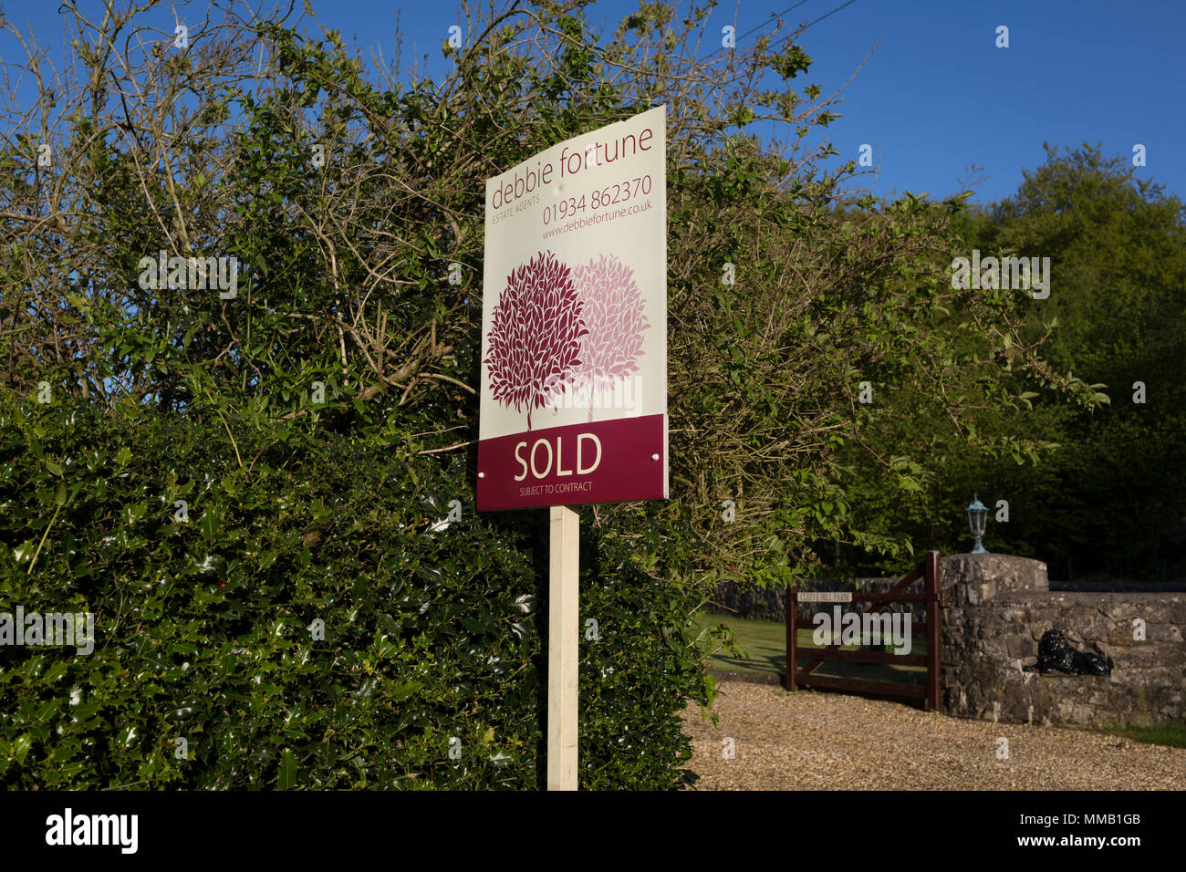 A Sold sign from a local north Somerset estate agency outside a rural
