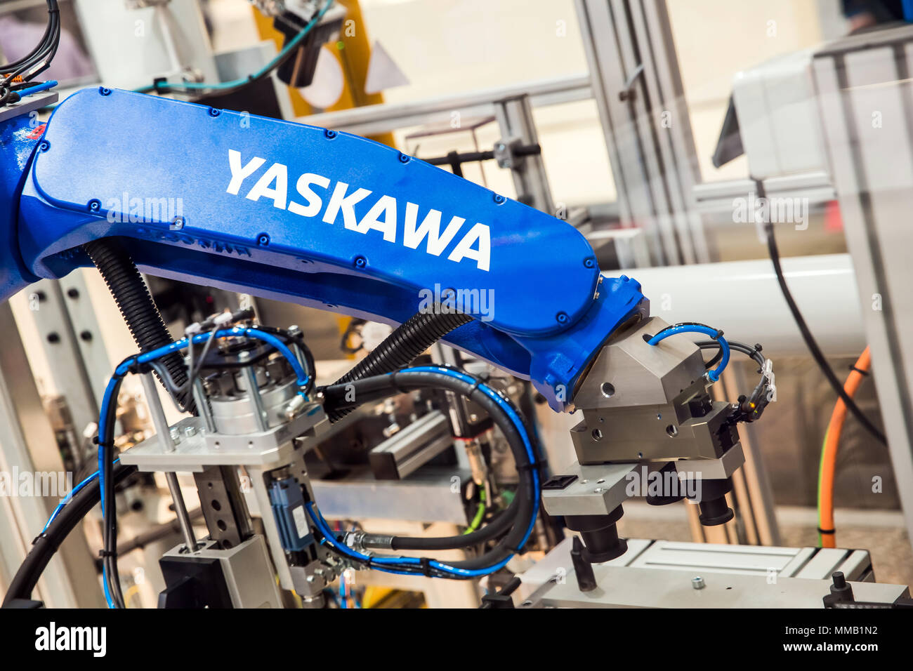Hannover, Germany - April, 2018: Yaskawa robot arm on Messe fair in Hannover, Germany Stock Photo