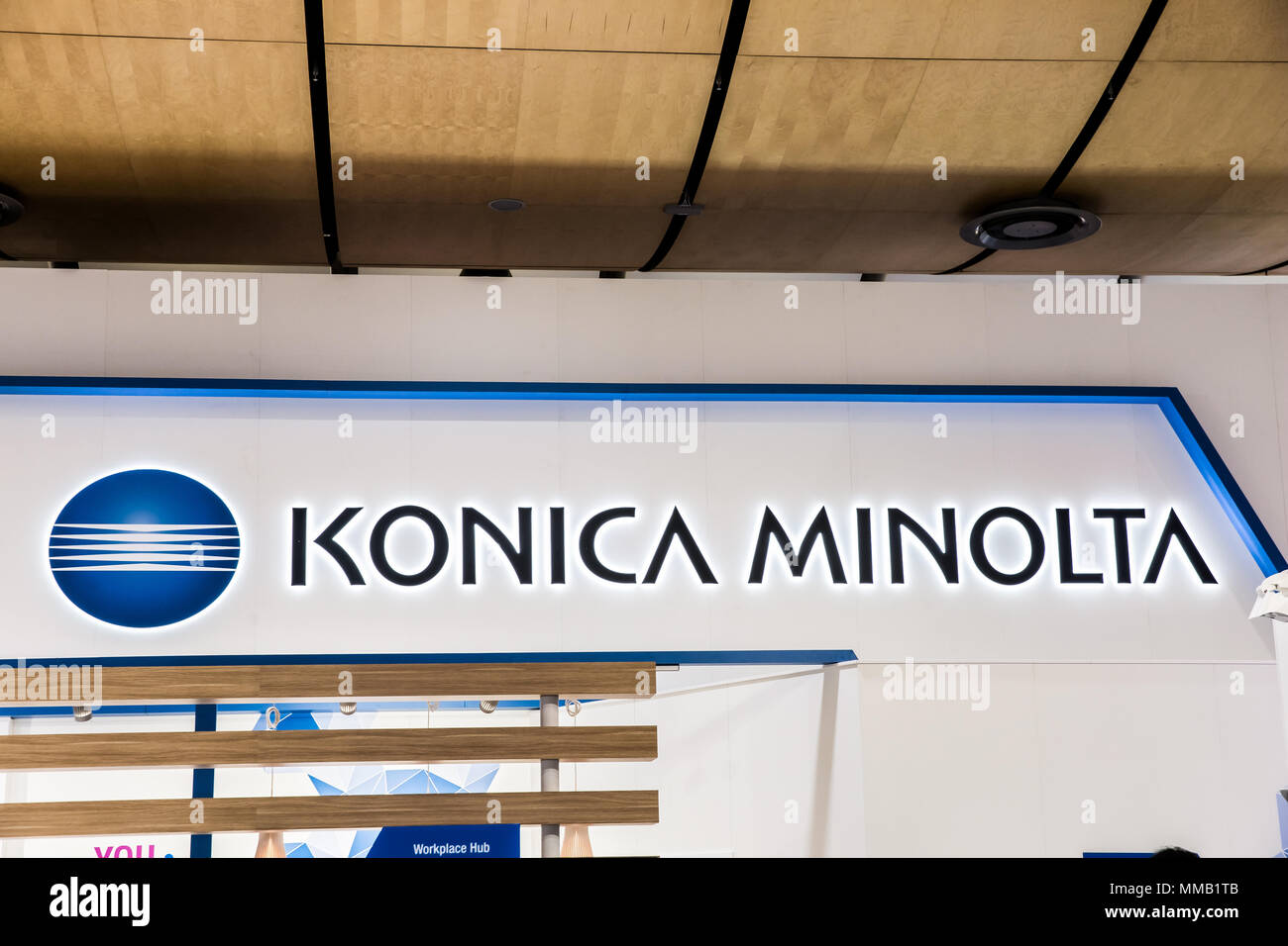 Hannover, Germany - April, 2018: Konica Minolta logo sign on booth stand on Messe fair in Hannover, Germany Stock Photo