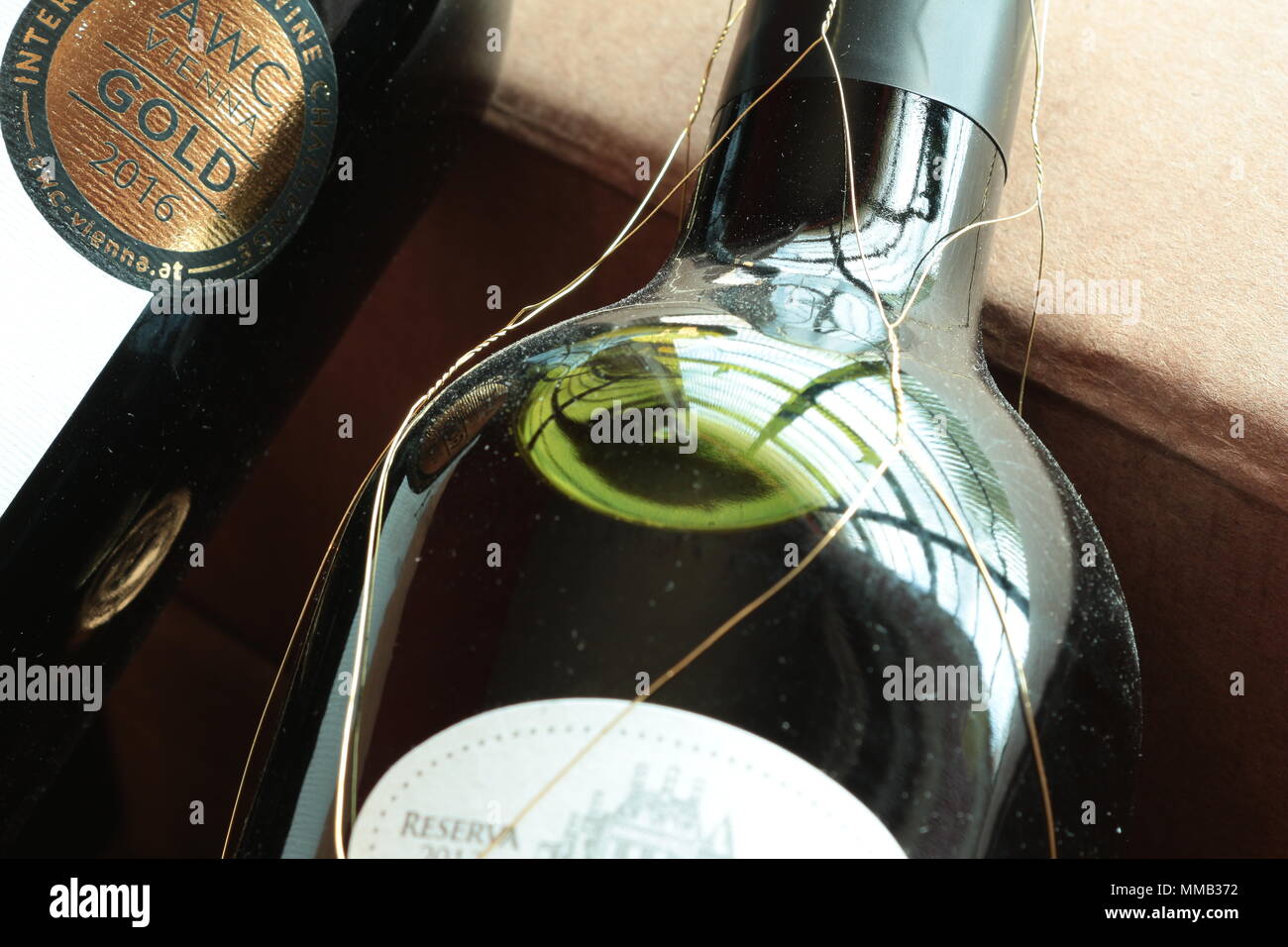 Wine bottles in cardboard box. Wine bottle labels. Portada Portuguese