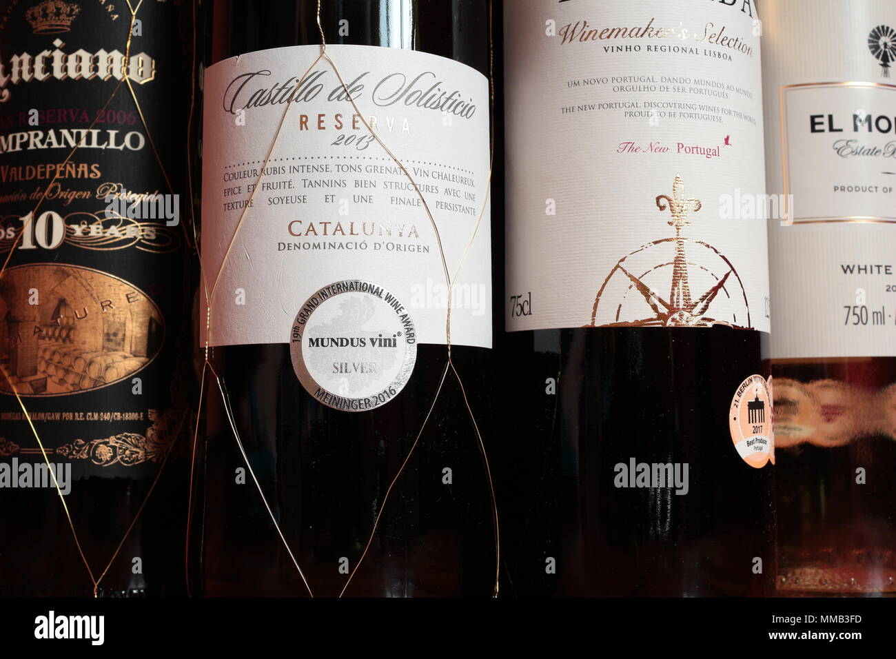 Wine bottles in cardboard box. Wine bottle labels. Portada Portuguese