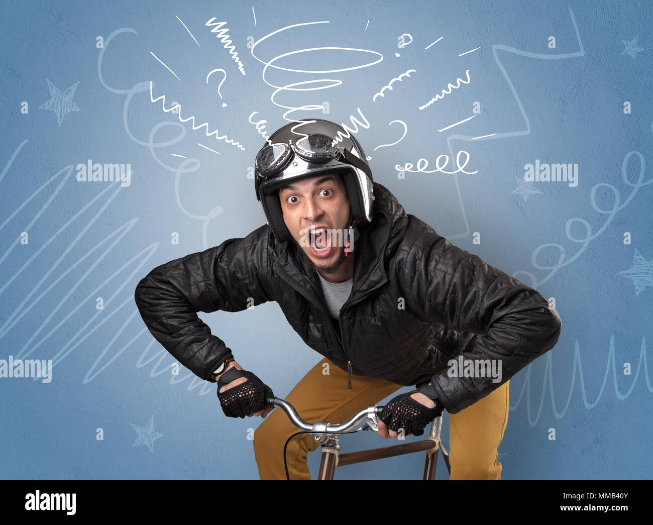 Young foolish crazy rider with doodle on the background Stock Photo - Alamy