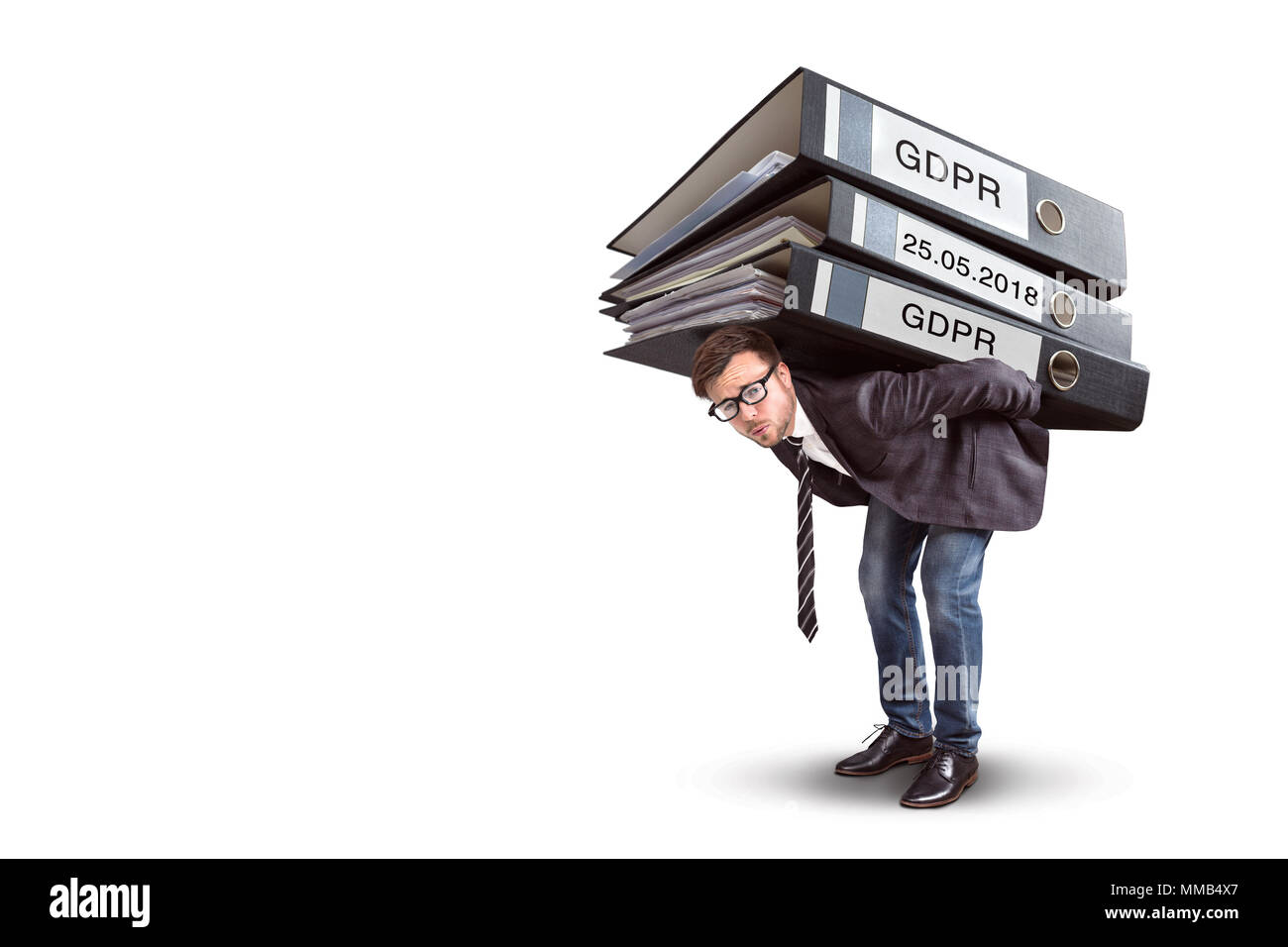 Man carrying an enormous stack of GDPR files Stock Photo