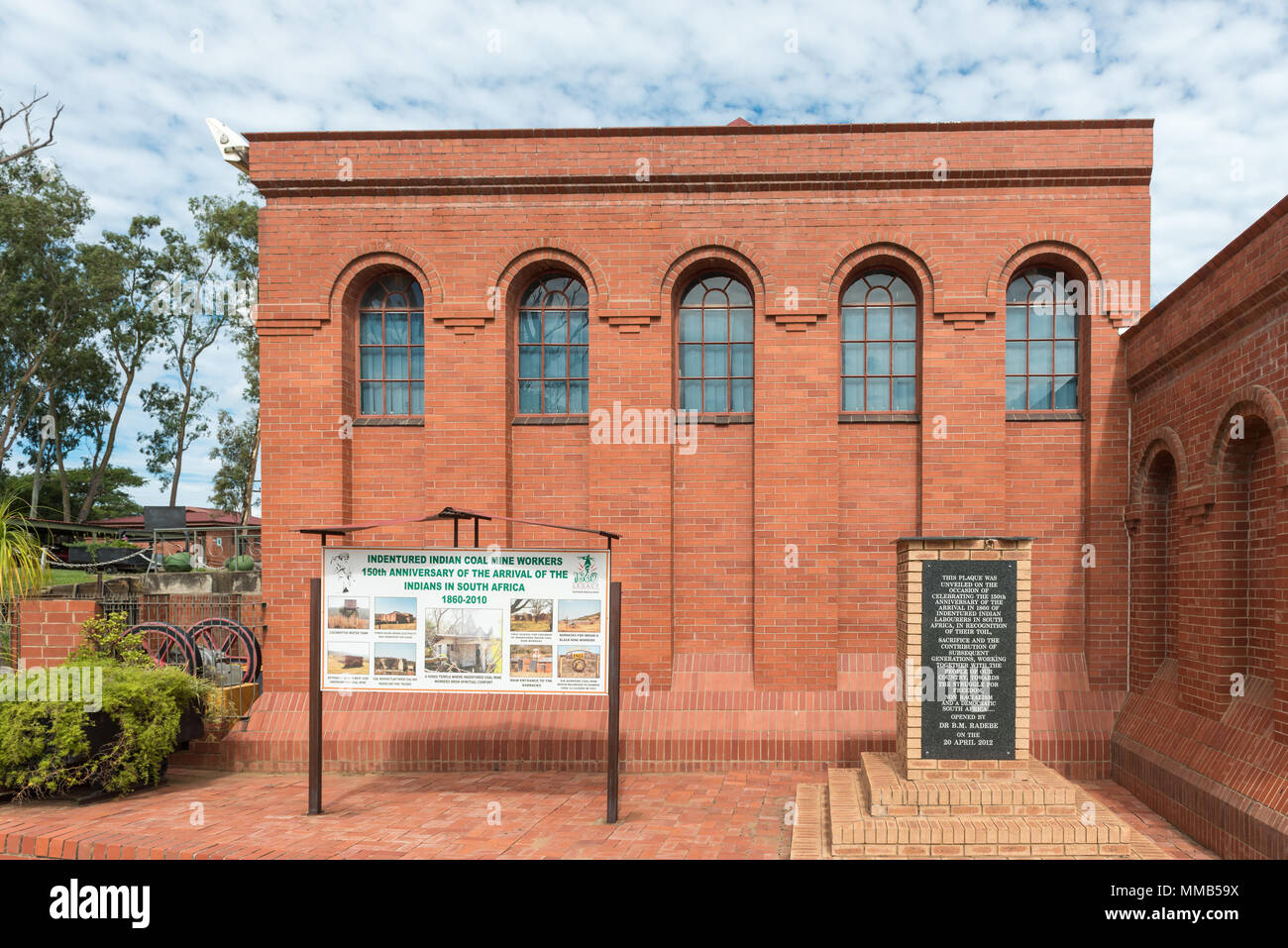 DUNDEE, SOUTH AFRICA - MARCH 21, 2018: An information board and plaque at the Talana museum, commemorating the arival of Indian labourers in South Afr Stock Photo