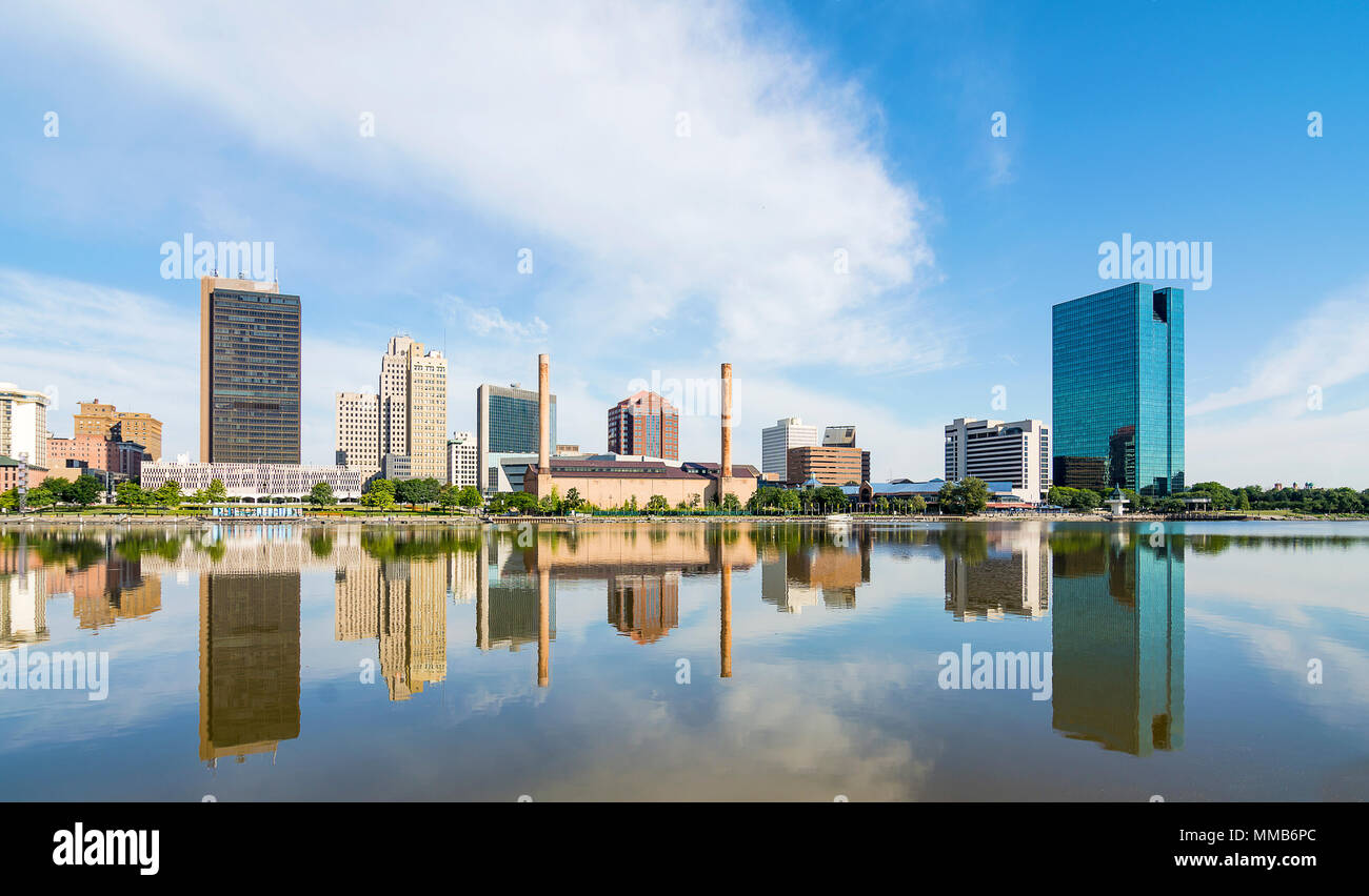 A Panoramic View Of Downtown Toledo Ohio S Skyline Reflecting Into The Maumee River A Beautiful Blue Sky With White Clouds For A Backdrop Stock Photo Alamy