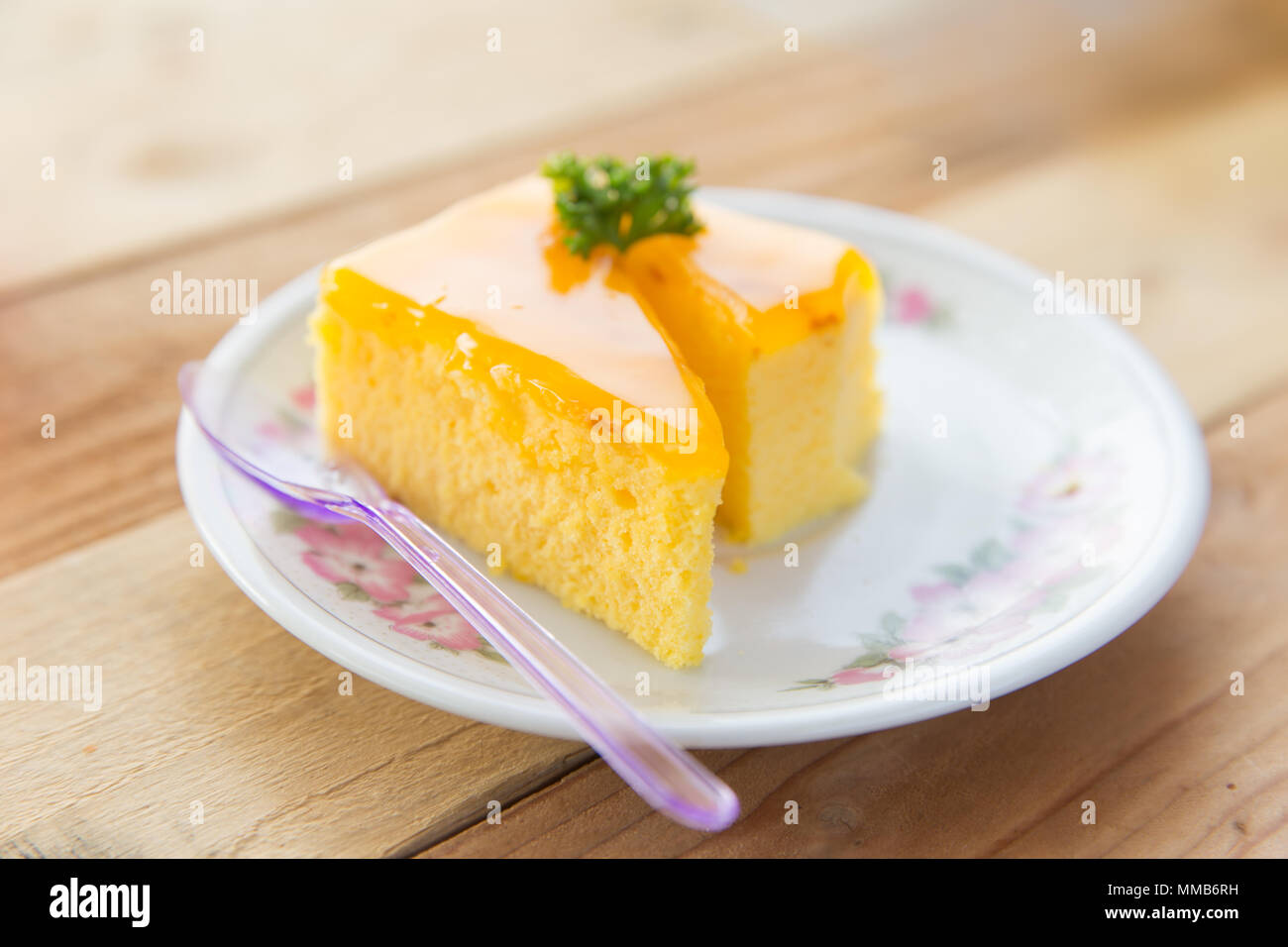 Orange cake on wooden table background Stock Photo