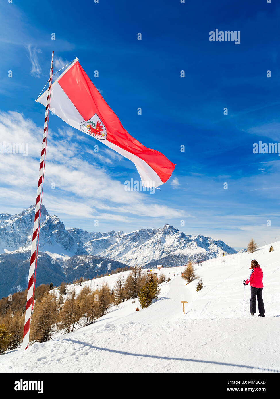 Austrian flag fluttering in front of the Italian Alps, Monte Elmo, Italy Stock Photo