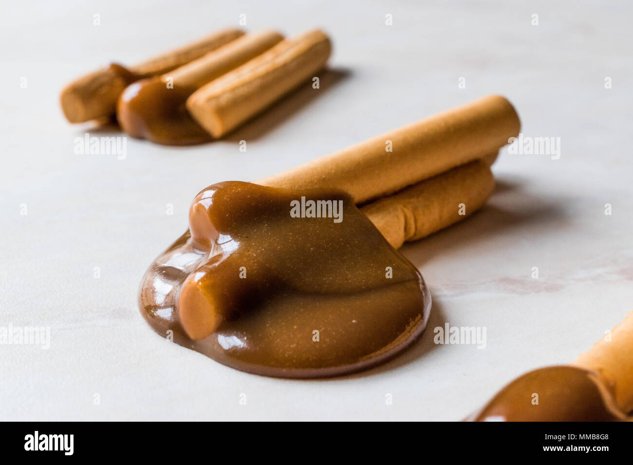 Turkish Tahin Pekmez / Tahini and Molasses with Salty Pretzel Stick