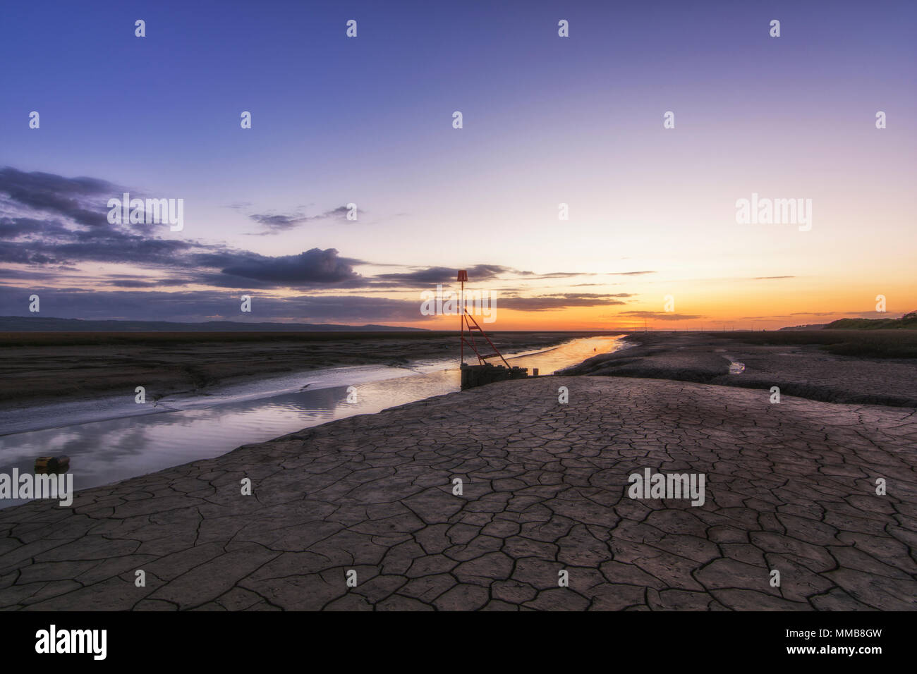 Lower Heswall boatyard and slipway wirral England UK Sunset Stock