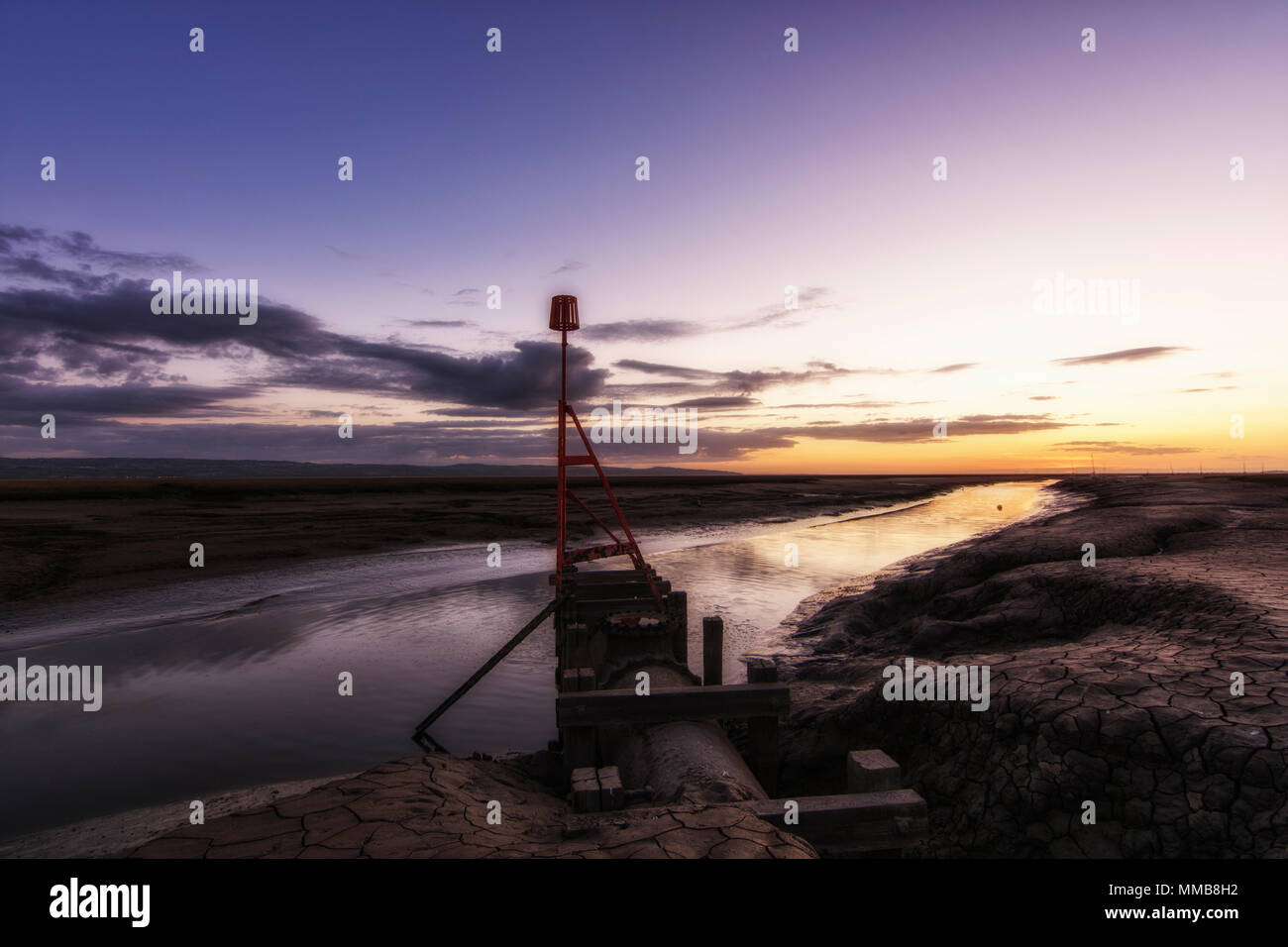 Lower Heswall boatyard and slipway wirral England UK Sunset Stock