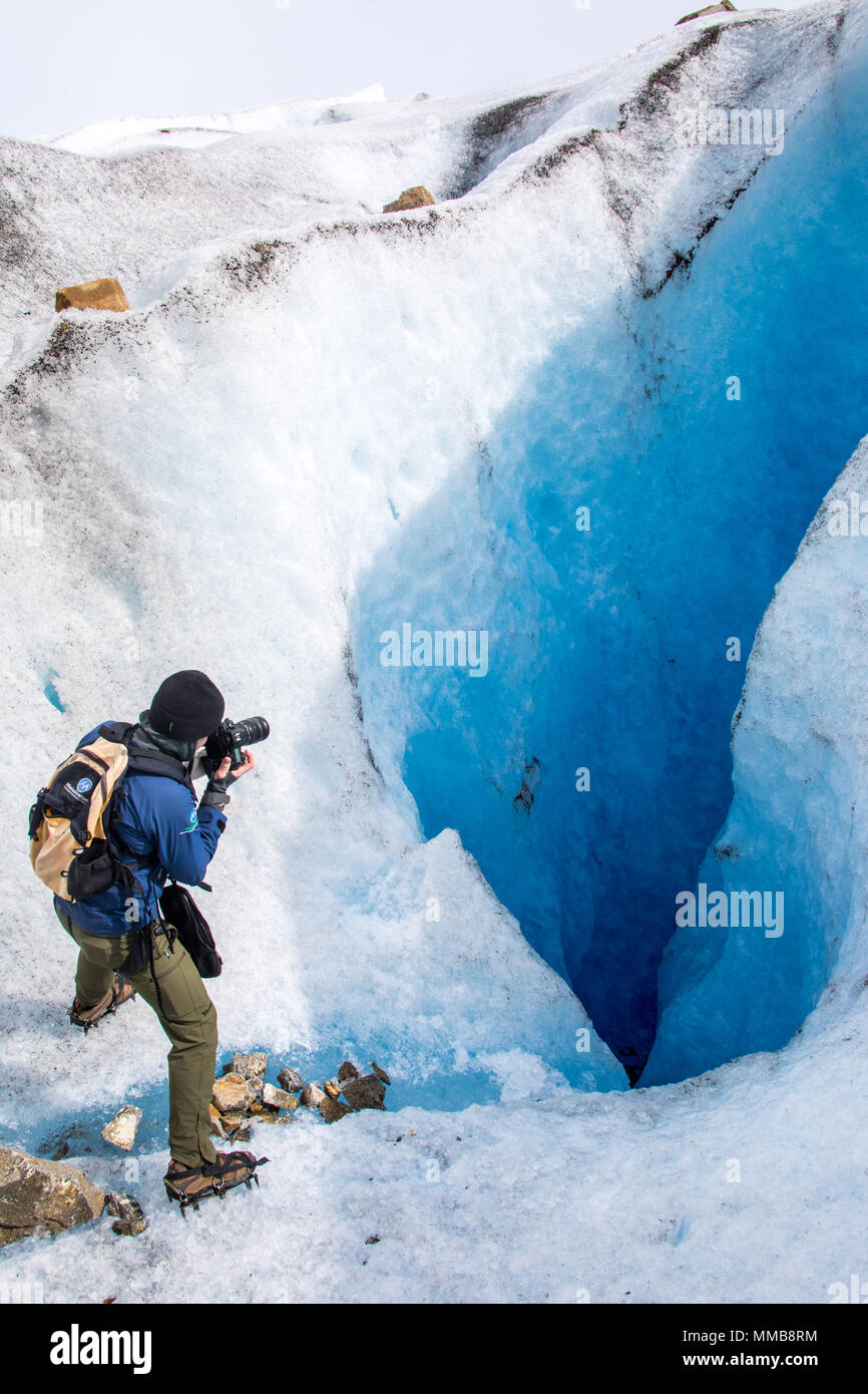 Tourists taking photos, Hielo Y Aventura Big Ice Tour, Perito Moreno Glacier, Glaciar Perito Moreno, Argentina Stock Photo