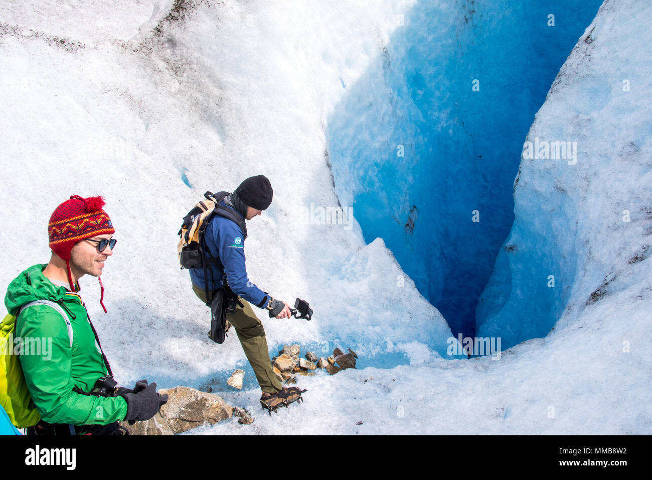 Tourists taking photos, Hielo Y Aventura Big Ice Tour, Perito Moreno Glacier, Glaciar Perito Moreno, Argentina Stock Photo