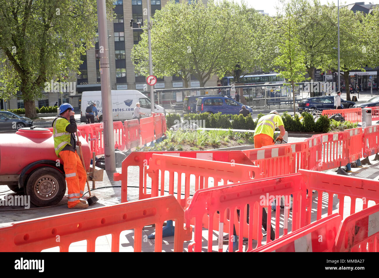 May 2018 - Road workers and orange safety barriers in Bristol for pavement works Stock Photo