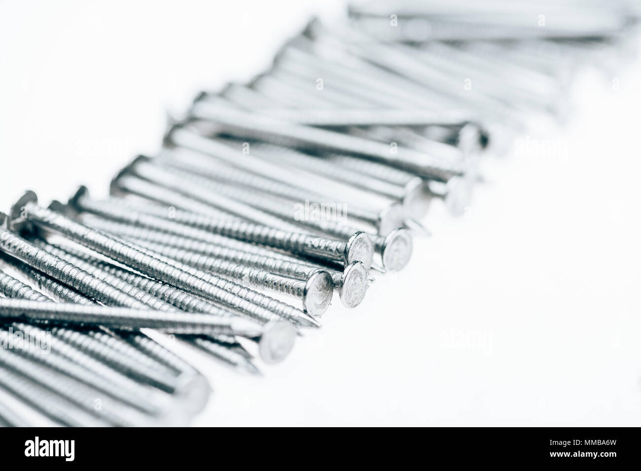 close up view of metal framing nails isolated on white Stock Photo Alamy
