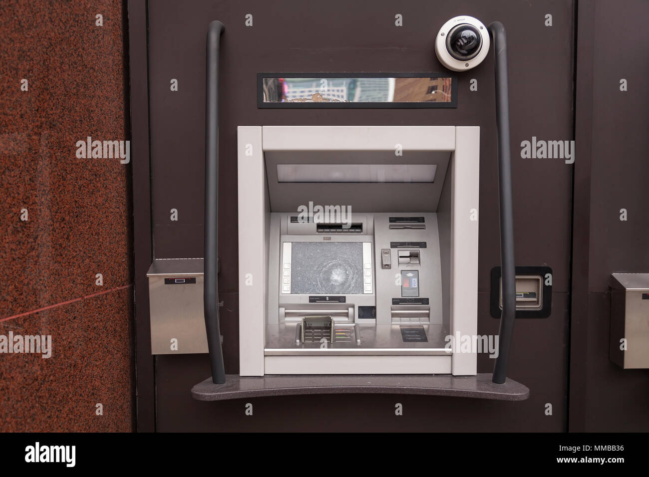 An ATM Automated Teller Machine with a smashed screen during the G20 summit in Downtown Toronto, Ontario, Canada. Stock Photo