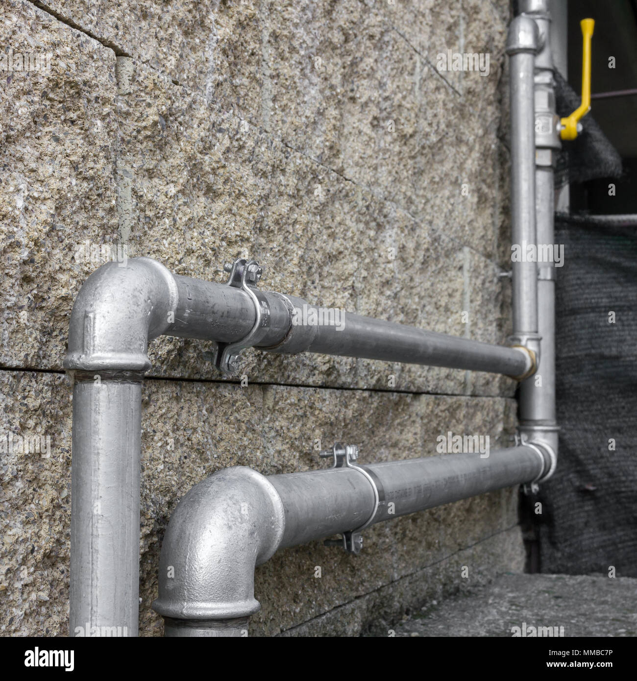 Pipes of a external heating system for distribution domestic gas Stock Photo