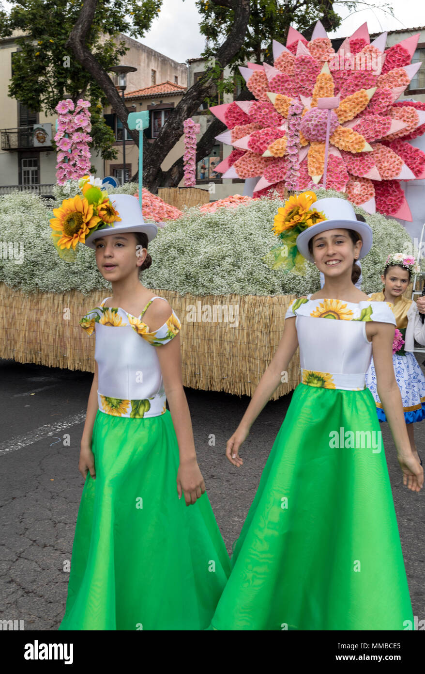 Funchal; Madeira; Portugal - April 22; 2018: The last moments before the parade,Girls in a colorful costumes at the Madeira Flower Festival , Funchal, Stock Photo