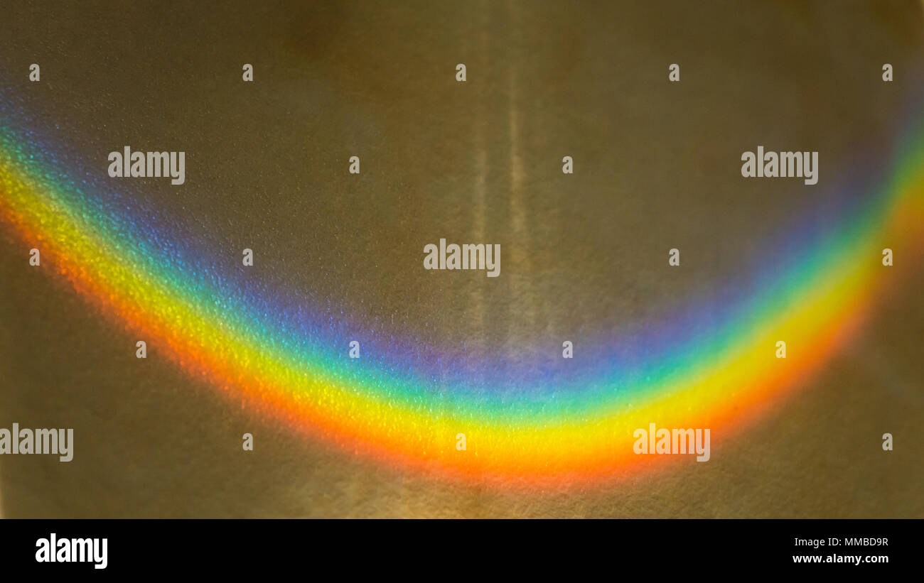 An anstract macro shot of sunlight passing through plastic and making a