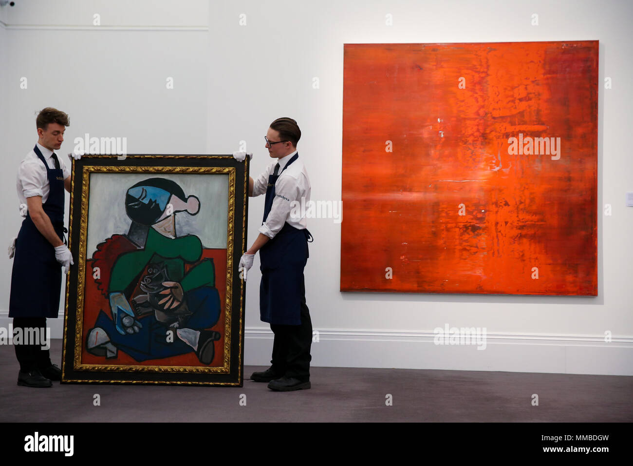 Femme au Chien by Pablo Picasso (Est $12 - $18m) (L) and Abstraktes Bild by Gerhard Richter (Est $15 - $20m) (R) as Sotheby's London unveils masterwork highlights of contemporary, impressionist & modern art; the auction will be held in New York on 14 May 2018.  Featuring: atmosphere Where: London, United Kingdom When: 09 Apr 2018 Credit: Dinendra Haria/WENN Stock Photo