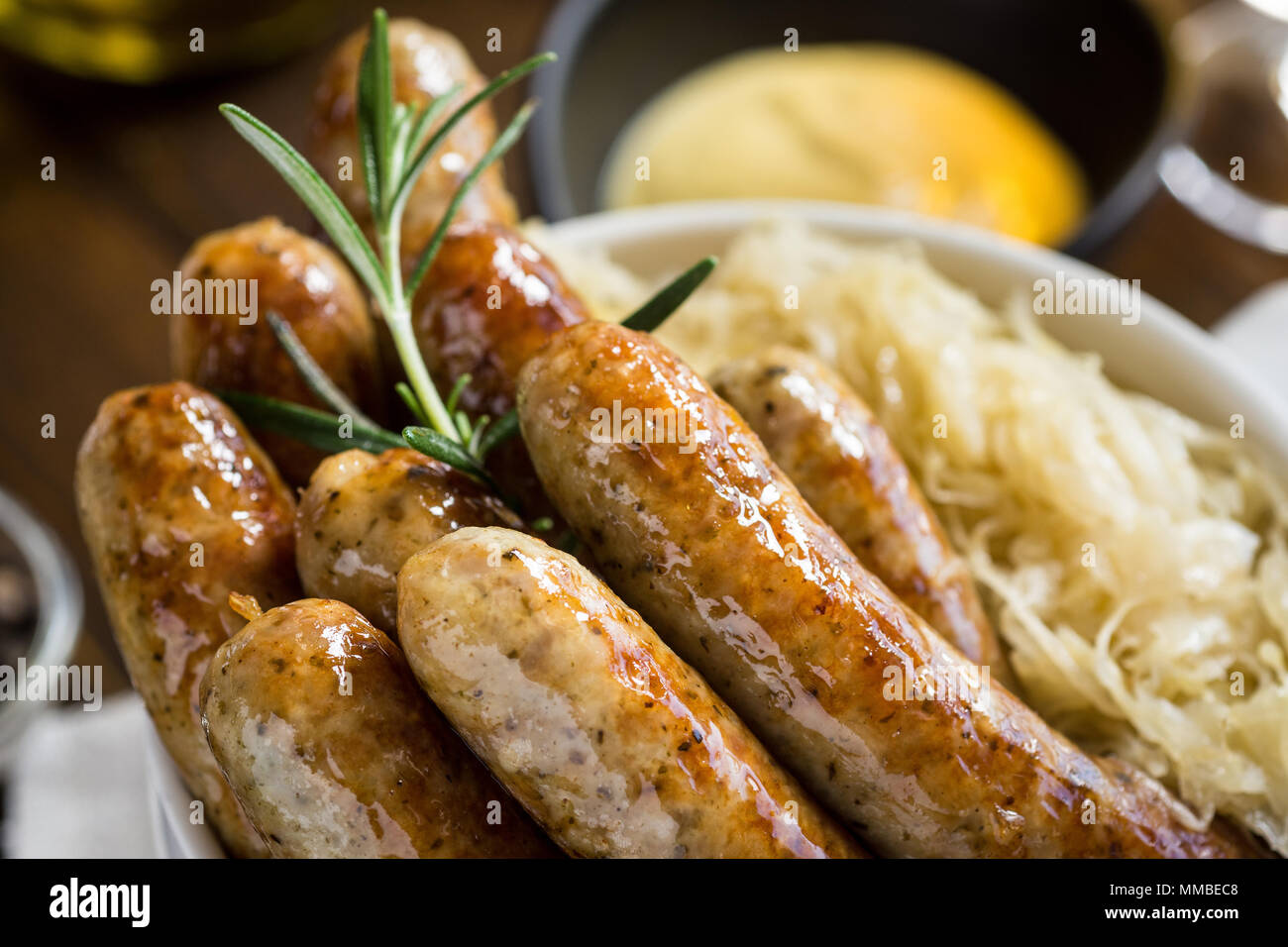 Grilled Sausages, Cabbage, Mustard and Beer Stock Photo Alamy