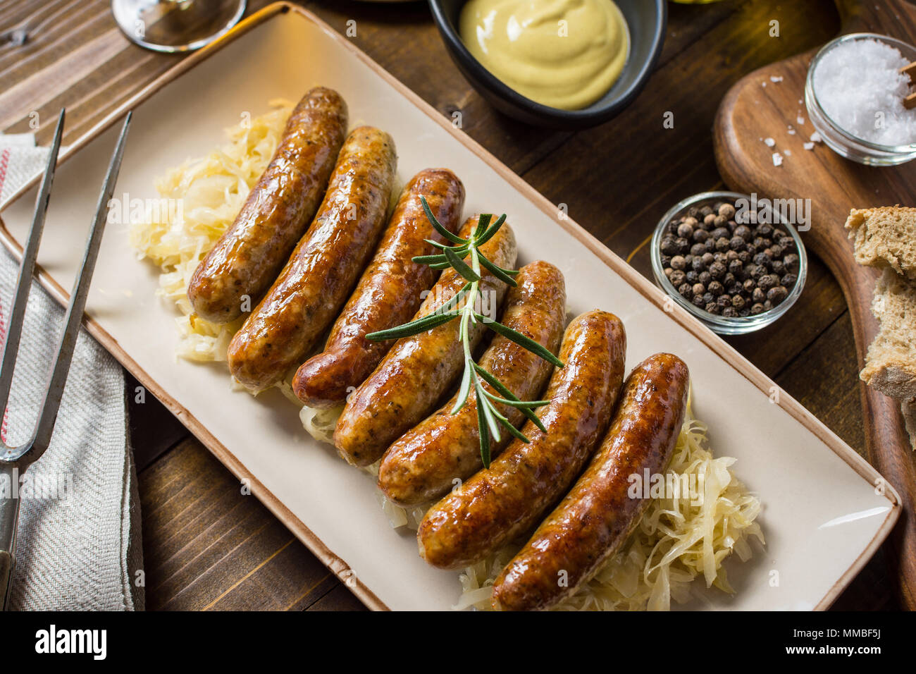 Homemade Pork Sausages with Cabbage, Mustard and Beer Stock Photo Alamy