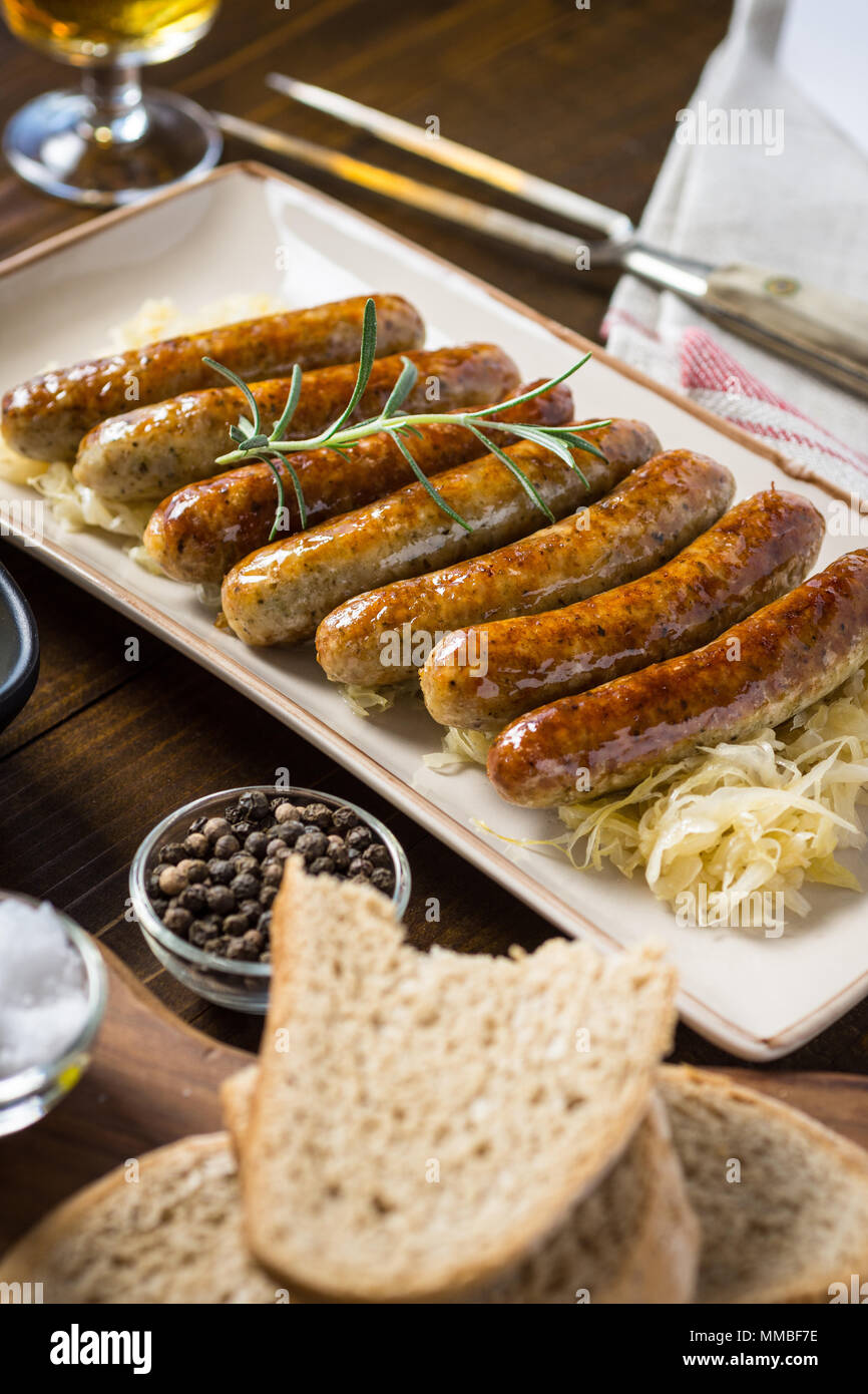 Homemade Pork Sausages with Cabbage, Mustard and Beer Stock Photo Alamy